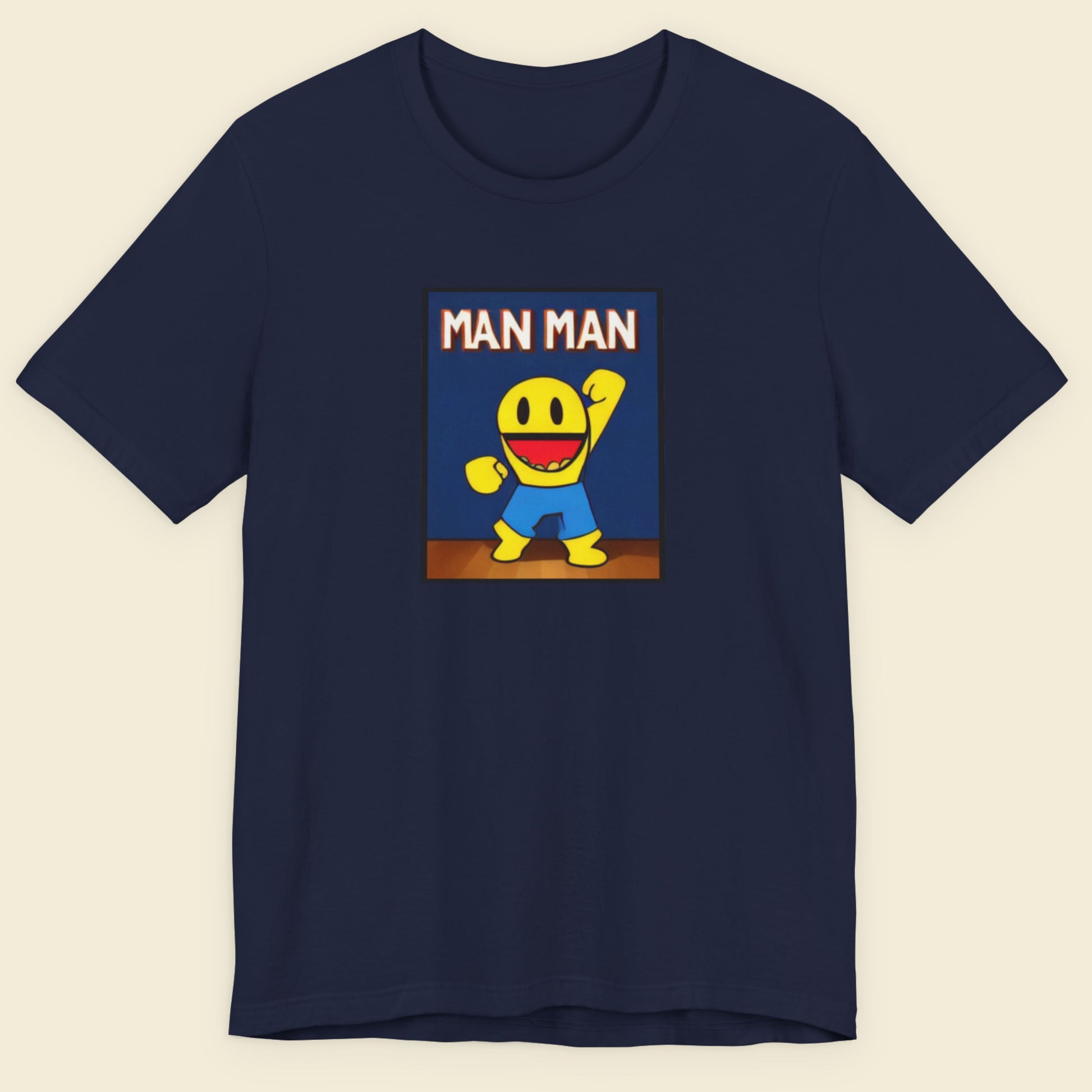 Navy blue t-shirt with a cartoon character graphic on a beige background.