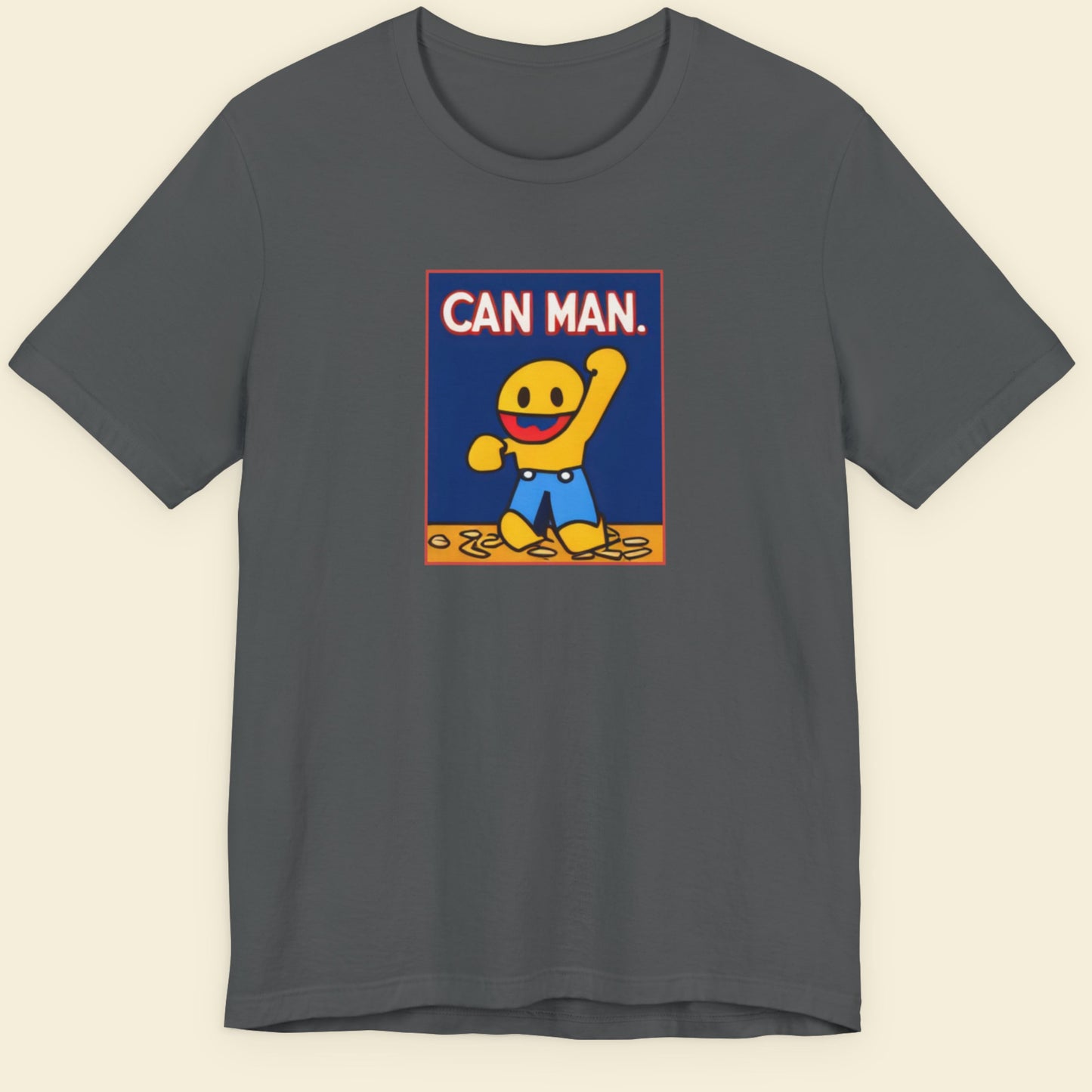 Gray t-shirt with a graphic of 'Can Man' on a beige background