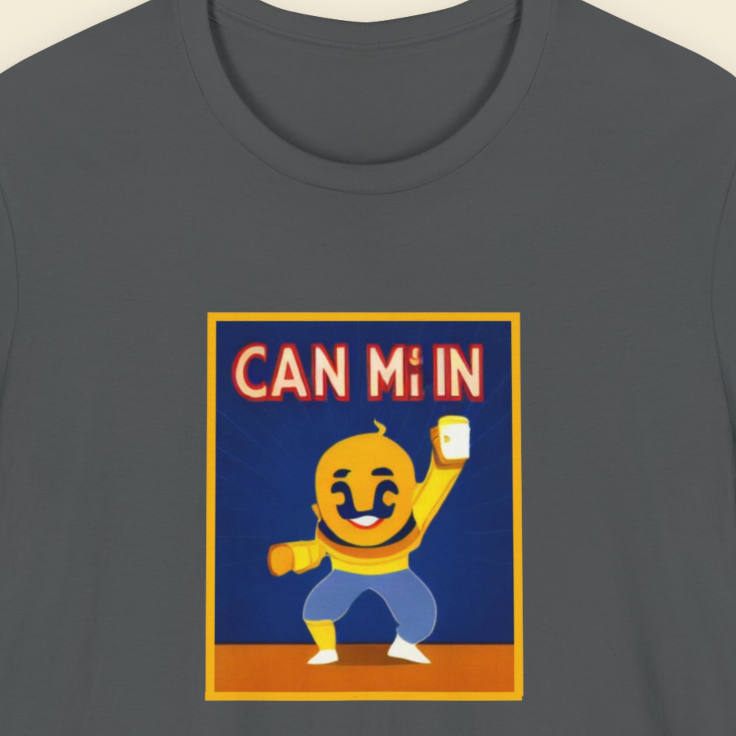 T-shirt with a cartoon character holding a can and text 'CAN Mi IN' on a dark gray background.