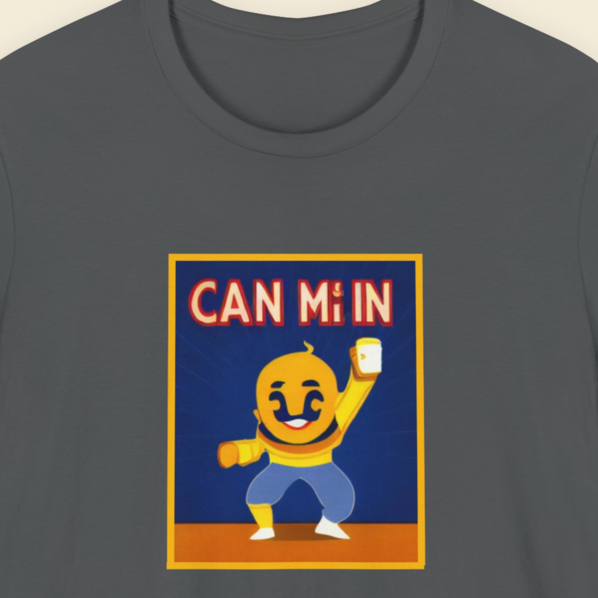 T-shirt with a cartoon character holding a can and text 'CAN Mi IN' on a dark gray background.