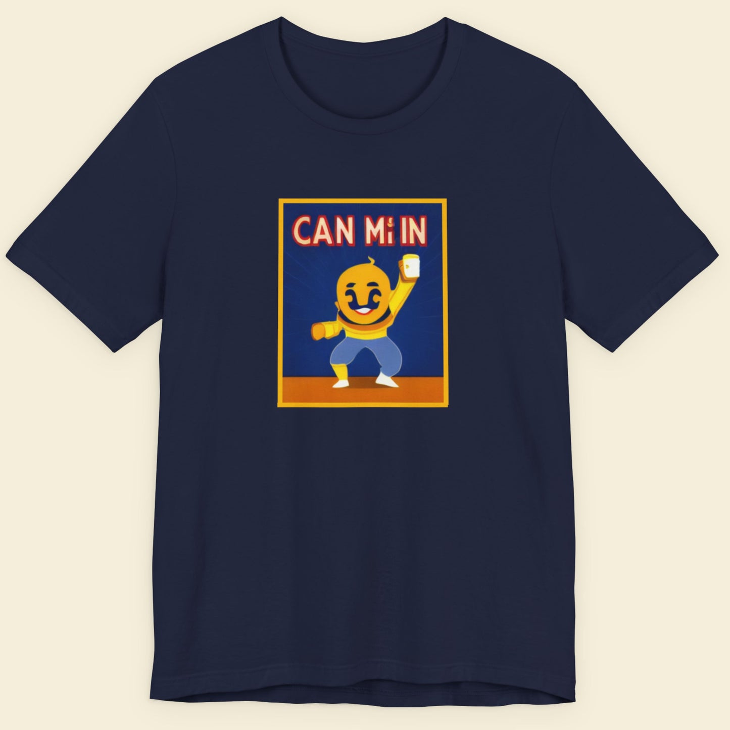 Navy blue t-shirt with a graphic of a character and text 'CAN Mi IN' on a beige background.