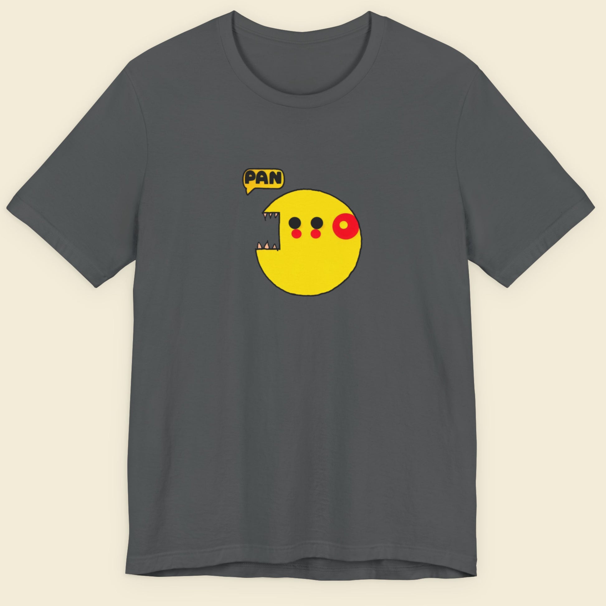 Gray t-shirt with a yellow character and 'PAN' text on a beige background.