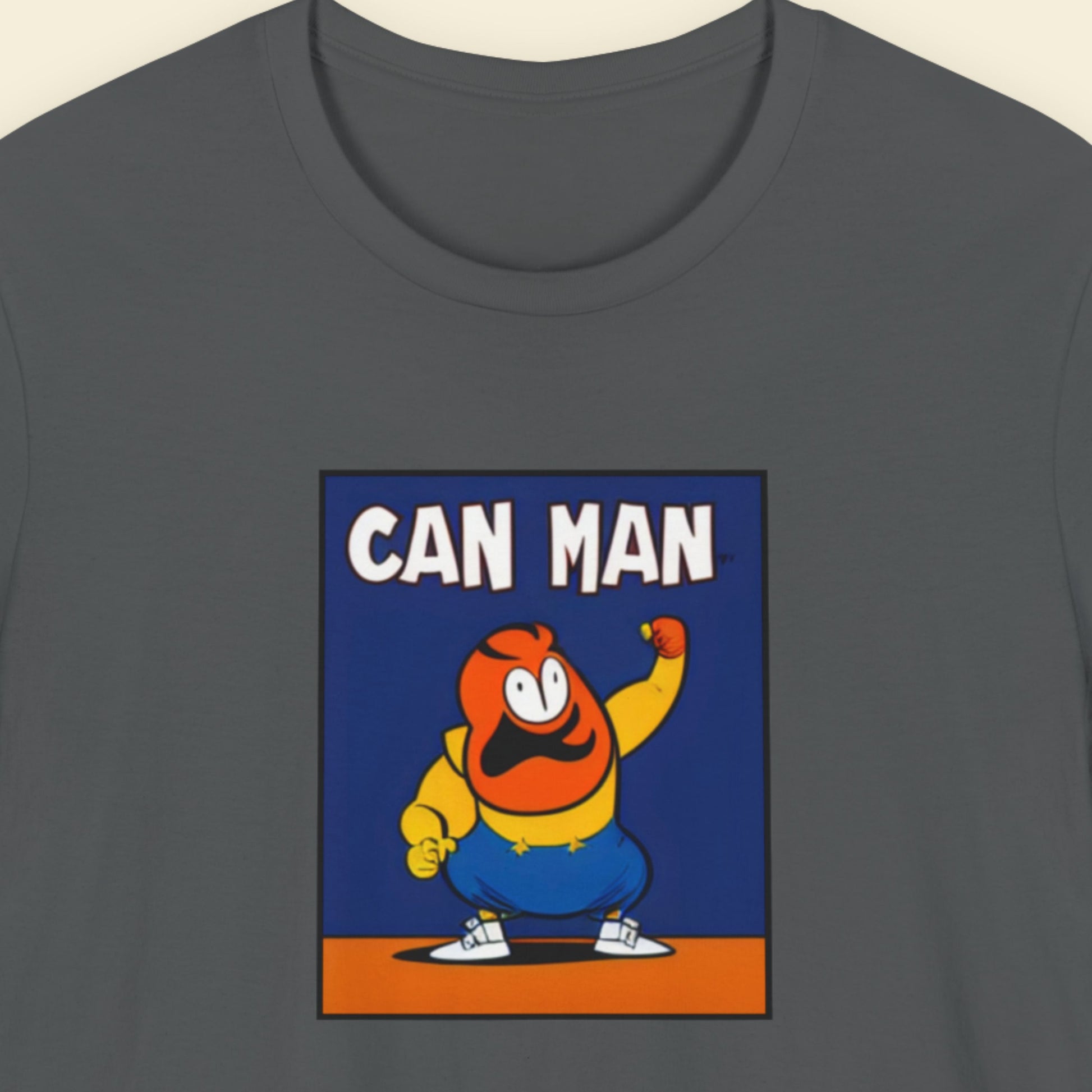 Gray t-shirt with a cartoon character and 'CAN MAN' text on a blue background.