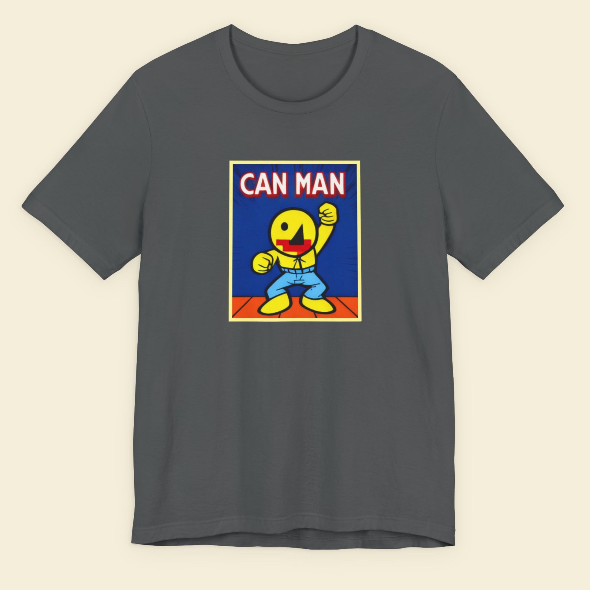 Gray t-shirt with a graphic of 'Can Man' on a beige background.