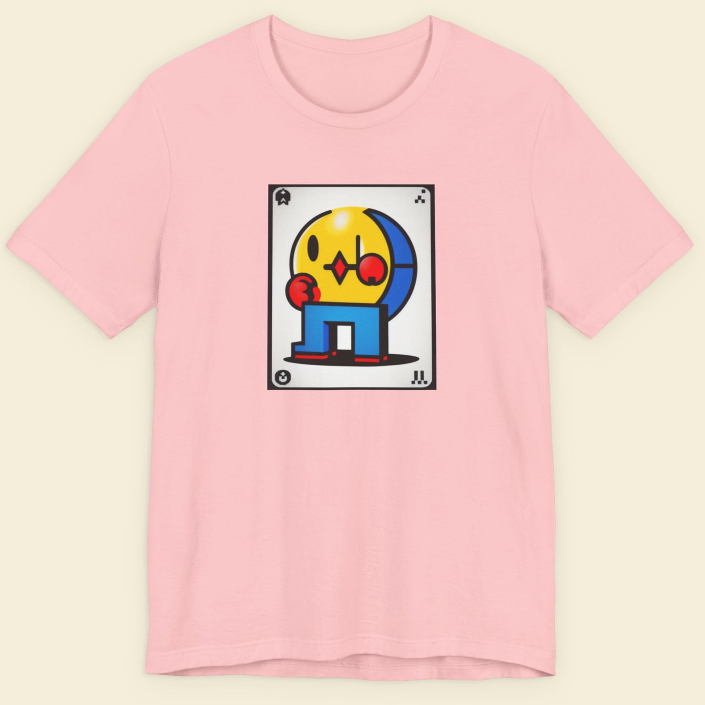 Pink t-shirt with a fun, colorful cartoon illustration on a beige background.