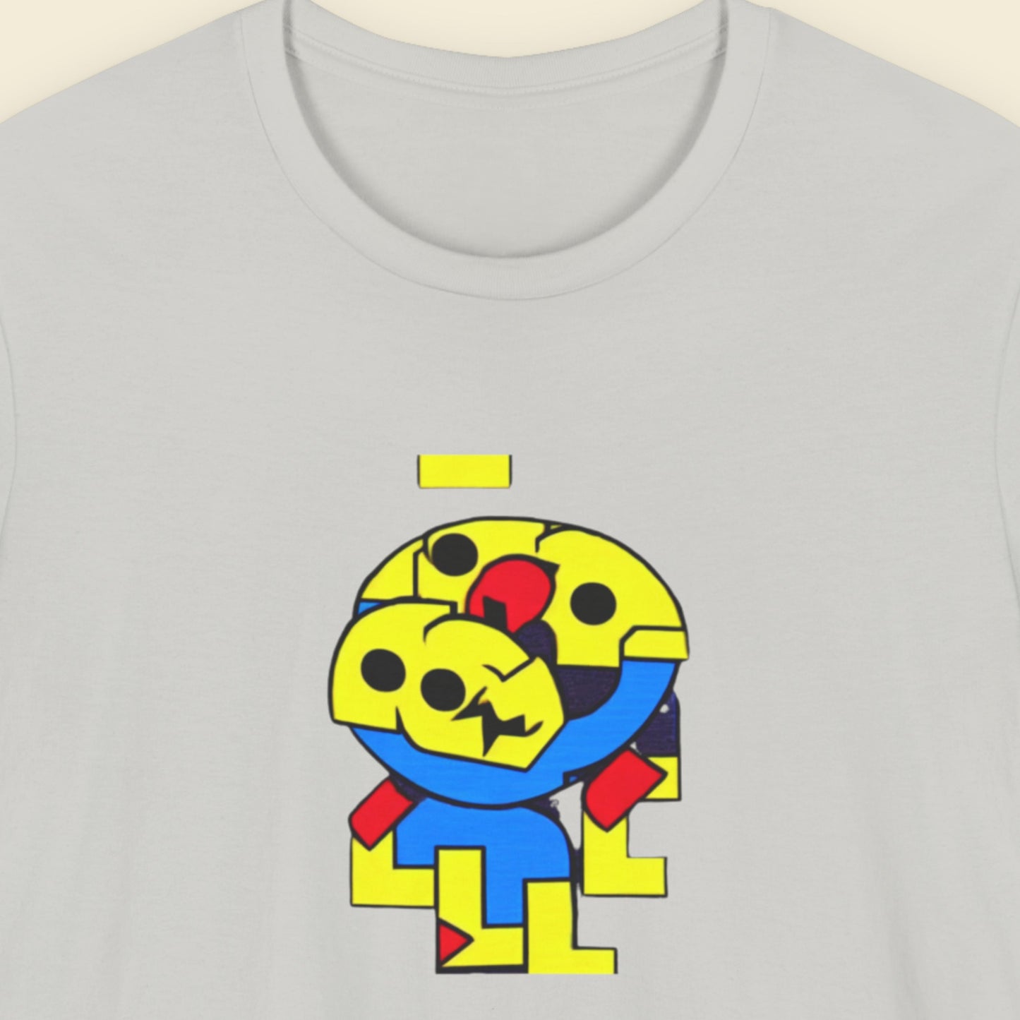 Light grey t-shirt with a fun, colorful cartoon illustration on a beige background.