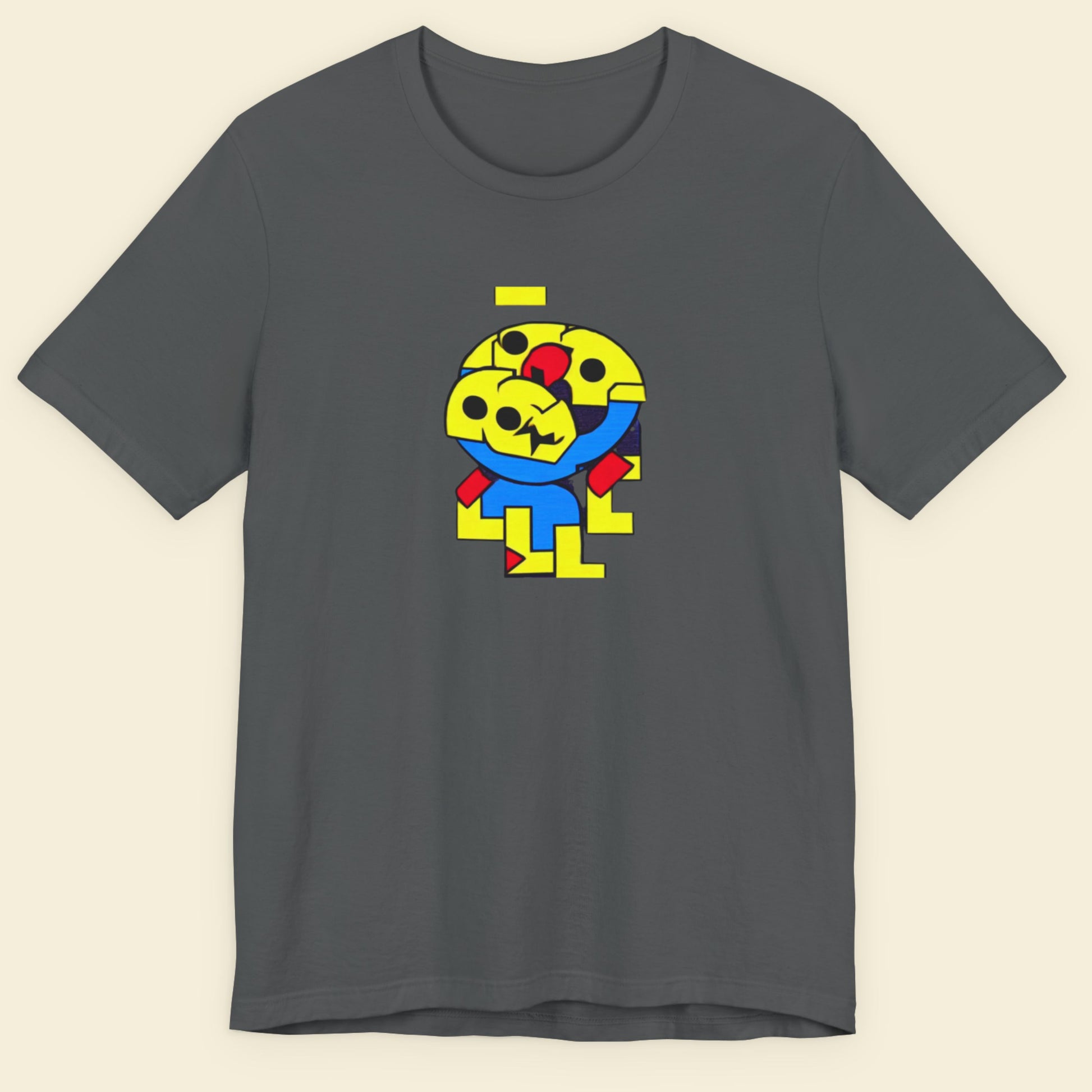 Gray t-shirt with a colorful graphic design on a beige background.