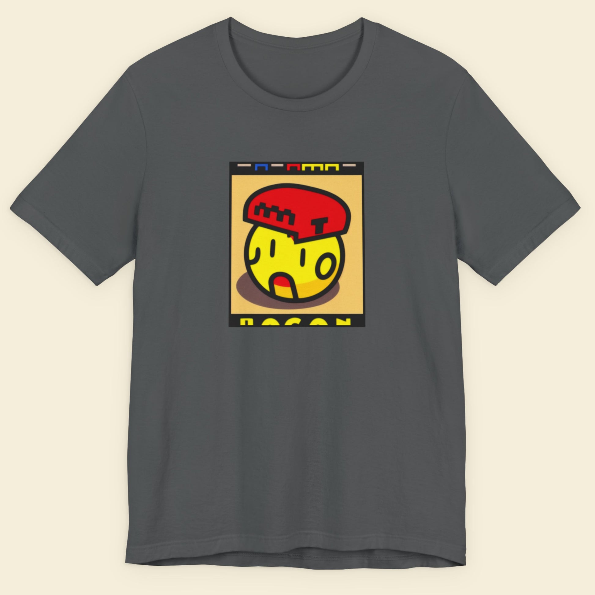 Dark gray t-shirt with a colorful graphic design on a beige background.