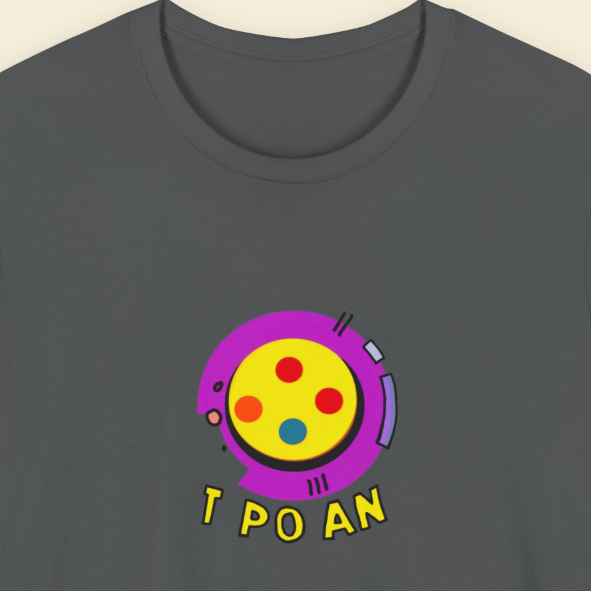 Grey t-shirt with a fun, colorful illustration on a beige background.
