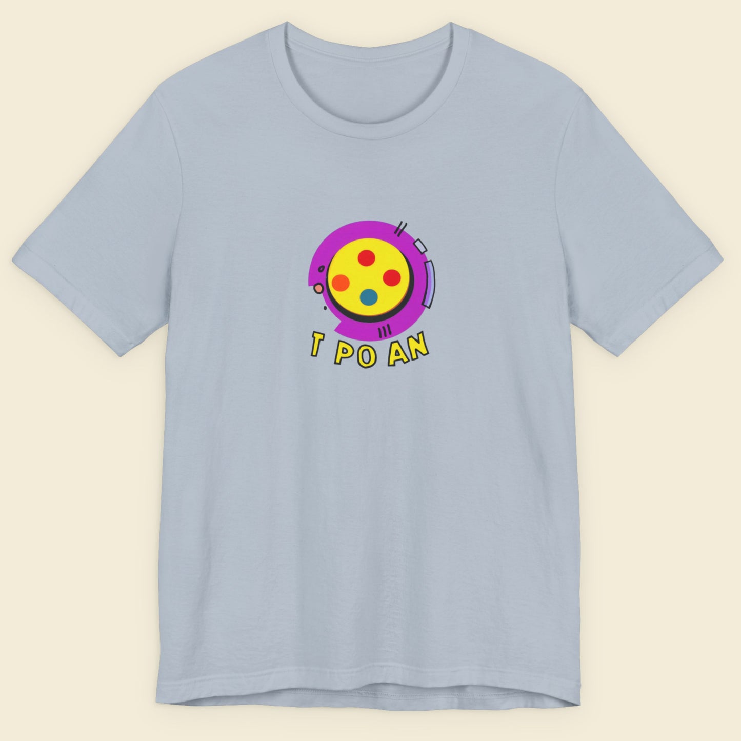 Light blue t-shirt with a fun, colorful illustration on a beige background.