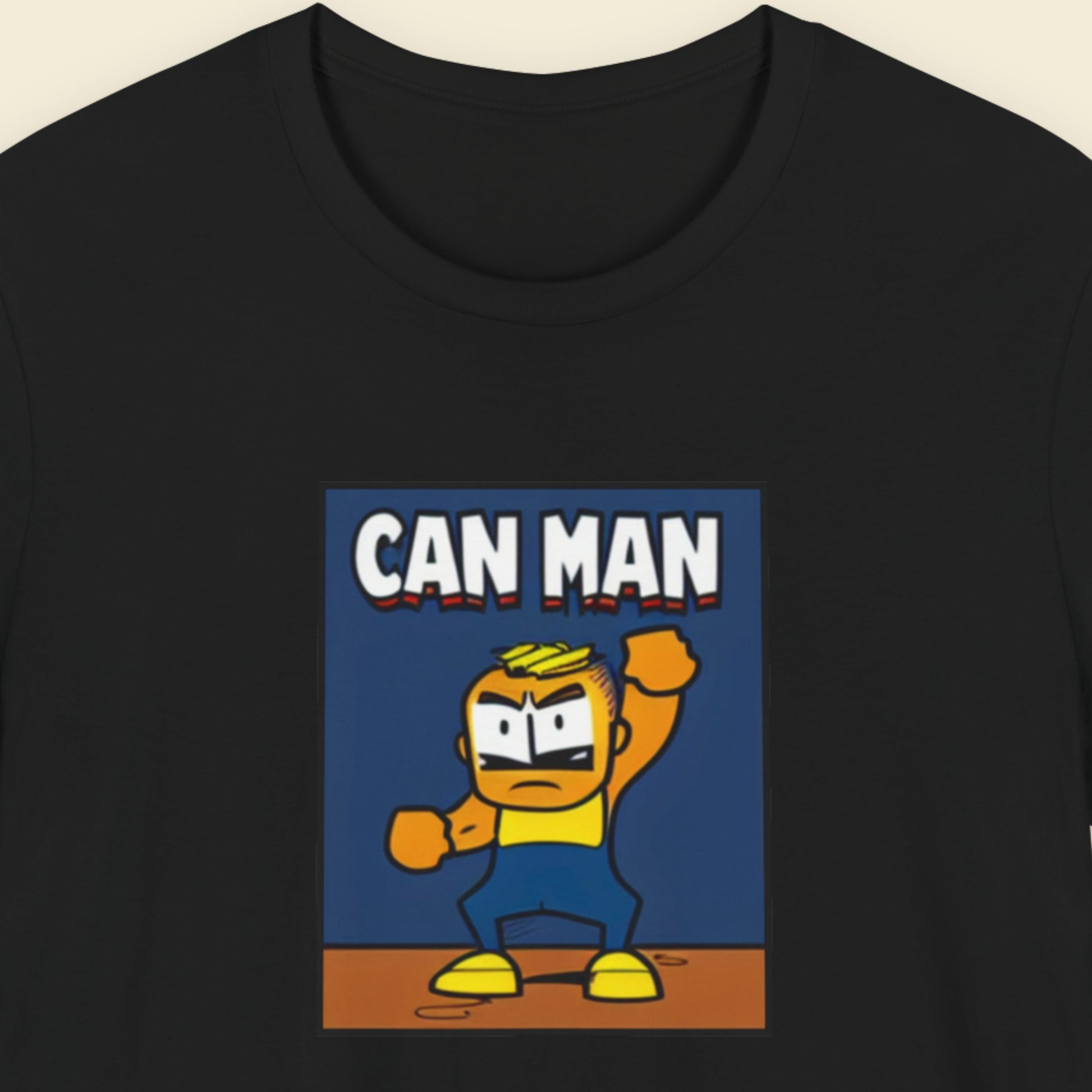 Black t-shirt with 'CAN MAN' graphic design featuring a cartoon character on a beige background.