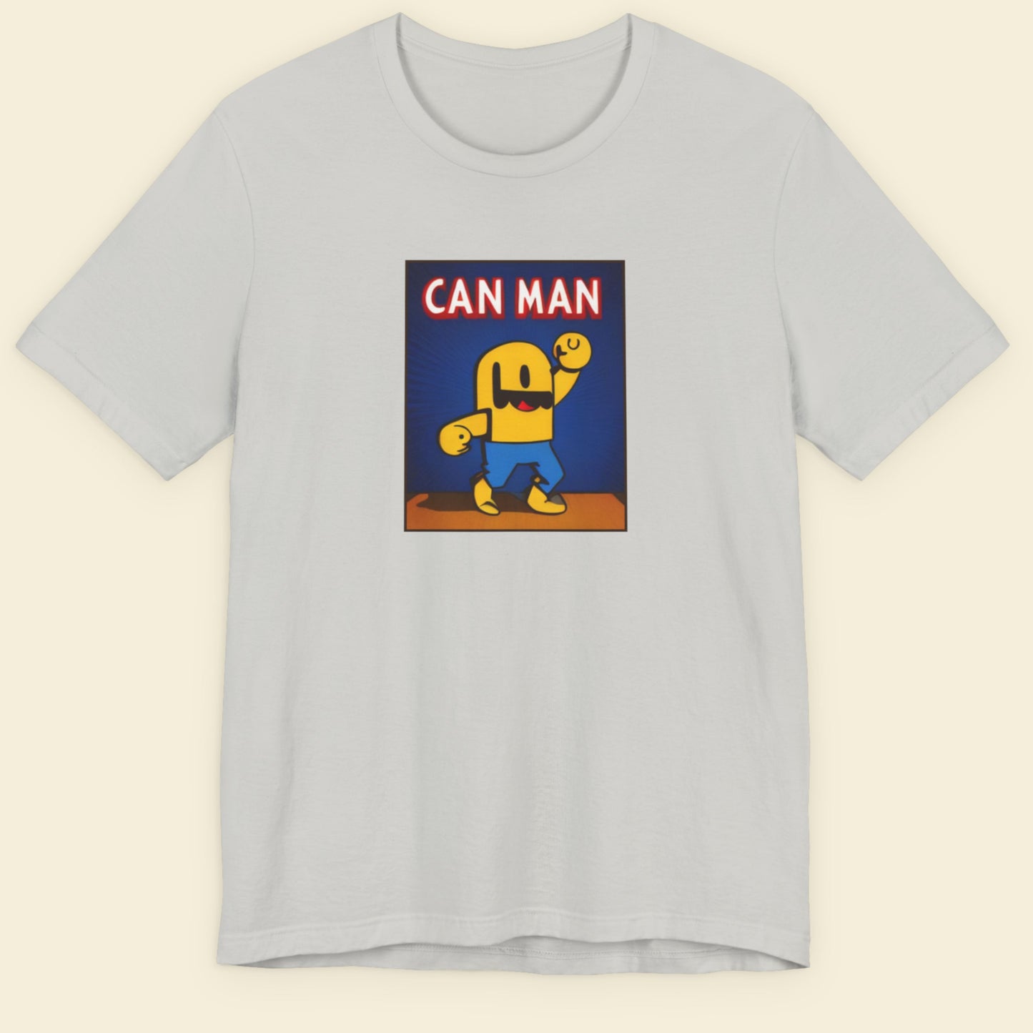 Light grey t-shirt with a fun, colorful Can Man cartoon illustration on a beige background.