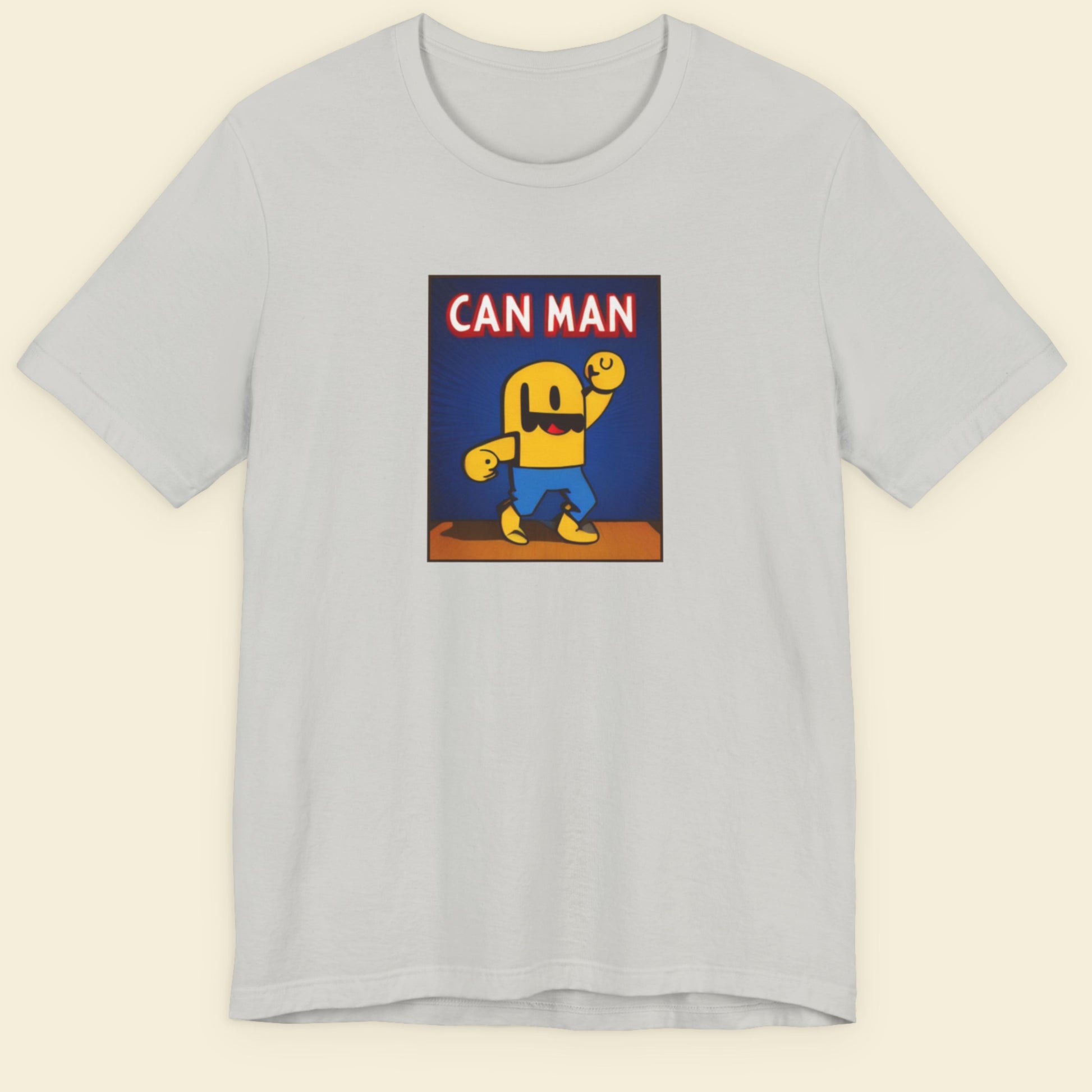Light grey t-shirt with a fun, colorful Can Man cartoon illustration on a beige background.