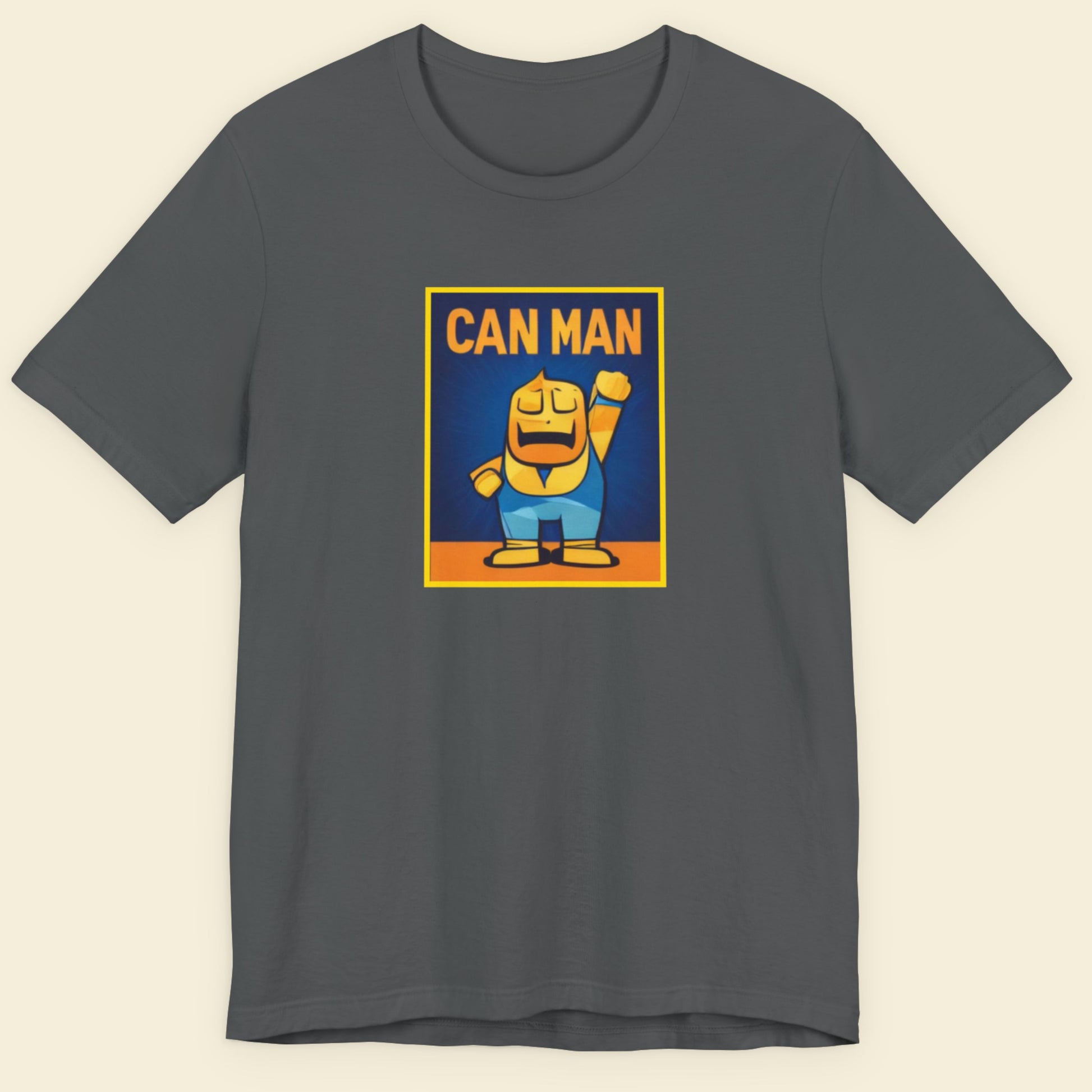 Grey t-shirt with a colorful cartoon illustration on a beige background.