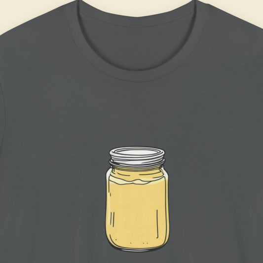 Dark gray t-shirt with a yellow jar graphic on a beige background.