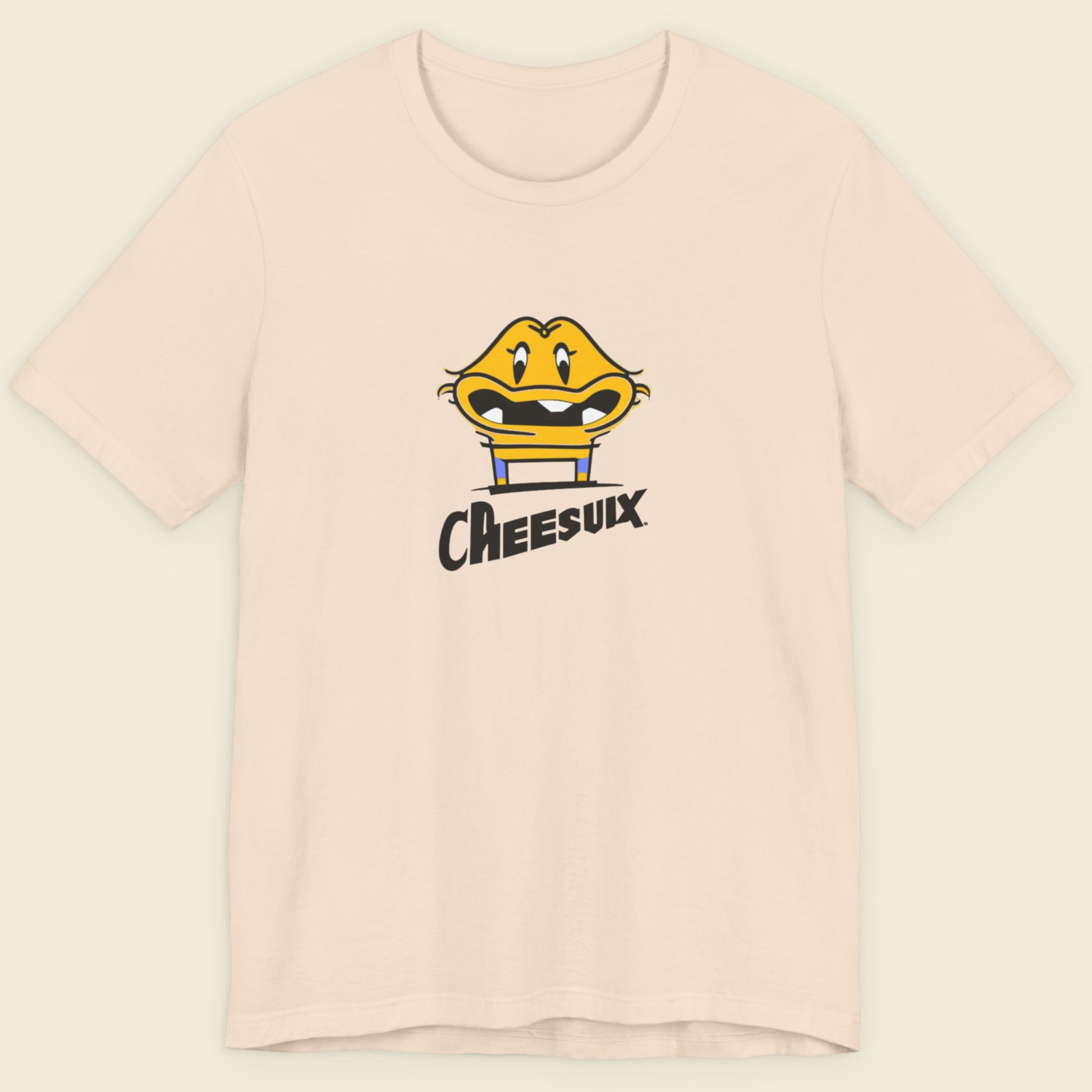 Beige t-shirt with a fun, colorful cartoon illustration on a beige background.