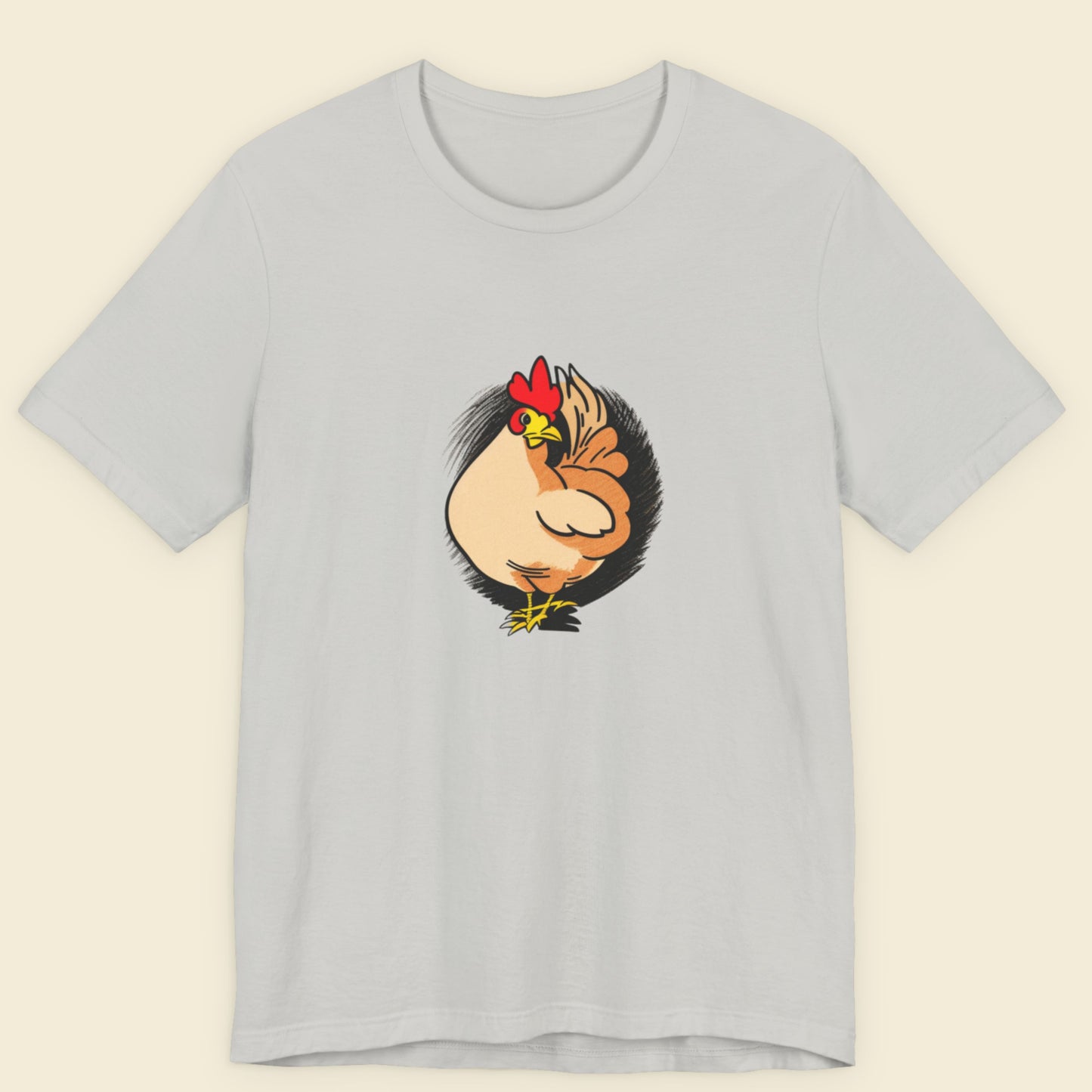 Light grey shirt with a colorful rooster illustration on a beige background.