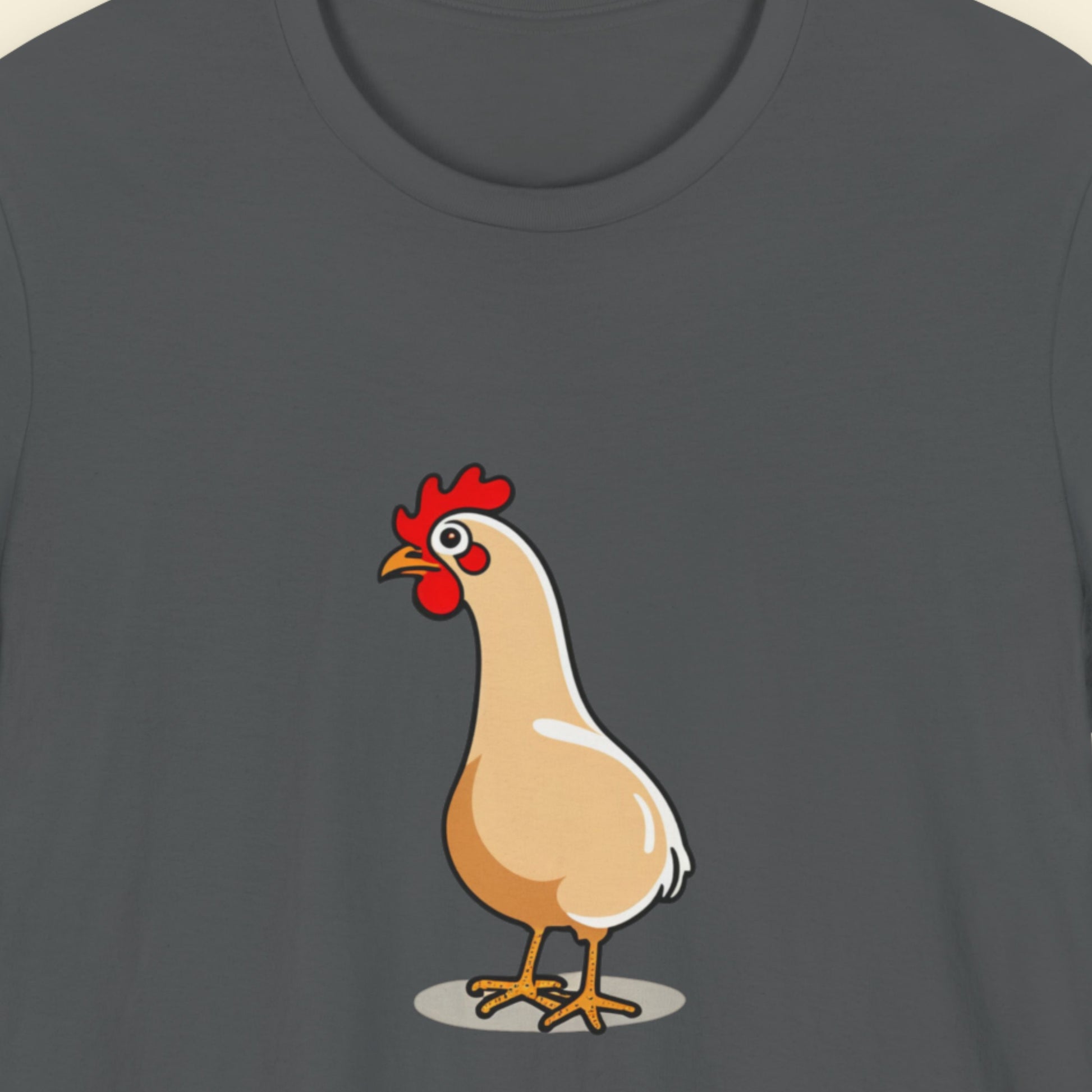 Dark grey shirt with an illustration of a rooster on a beige background.