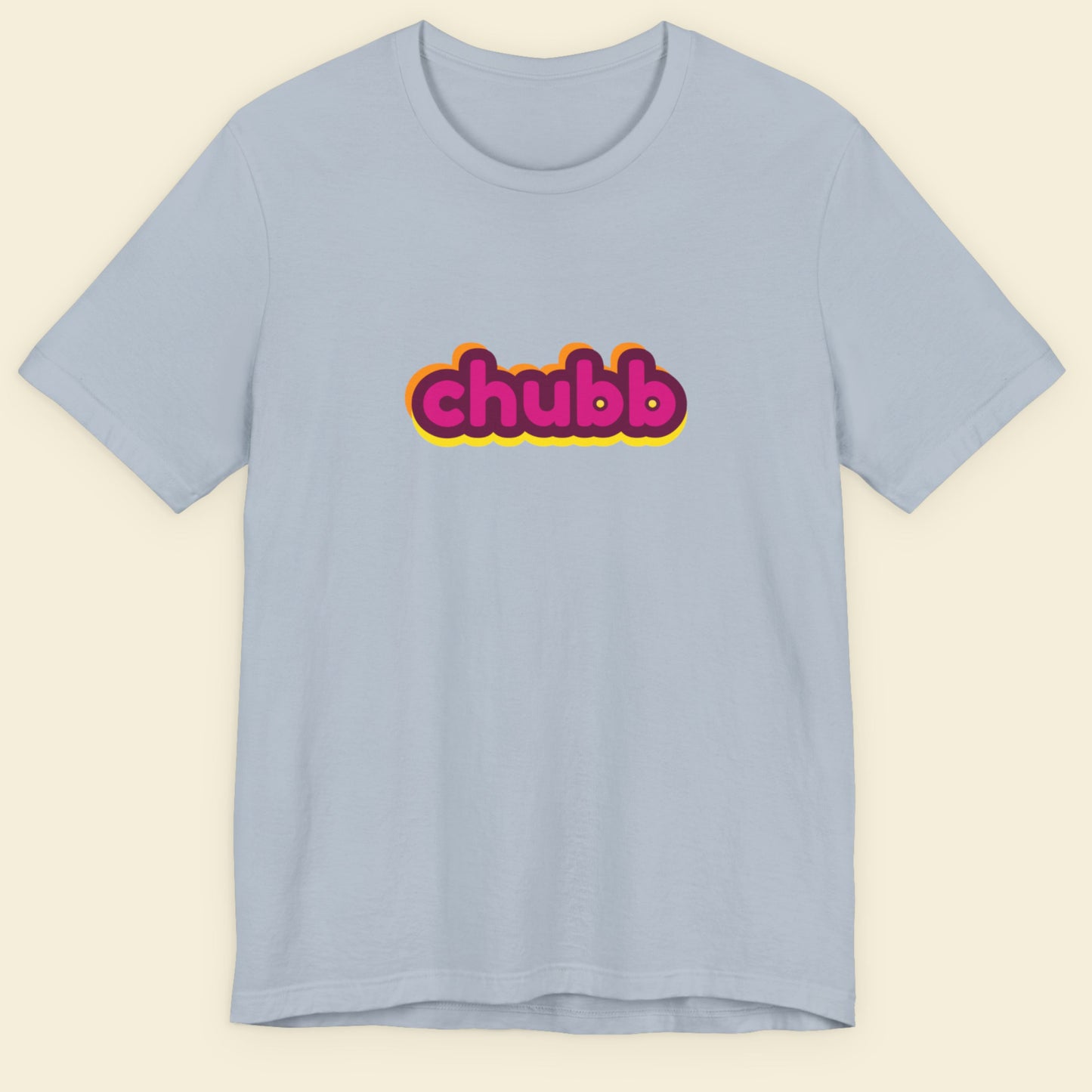 Light blue t-shirt with multicolored 'chubb' text on a beige background.