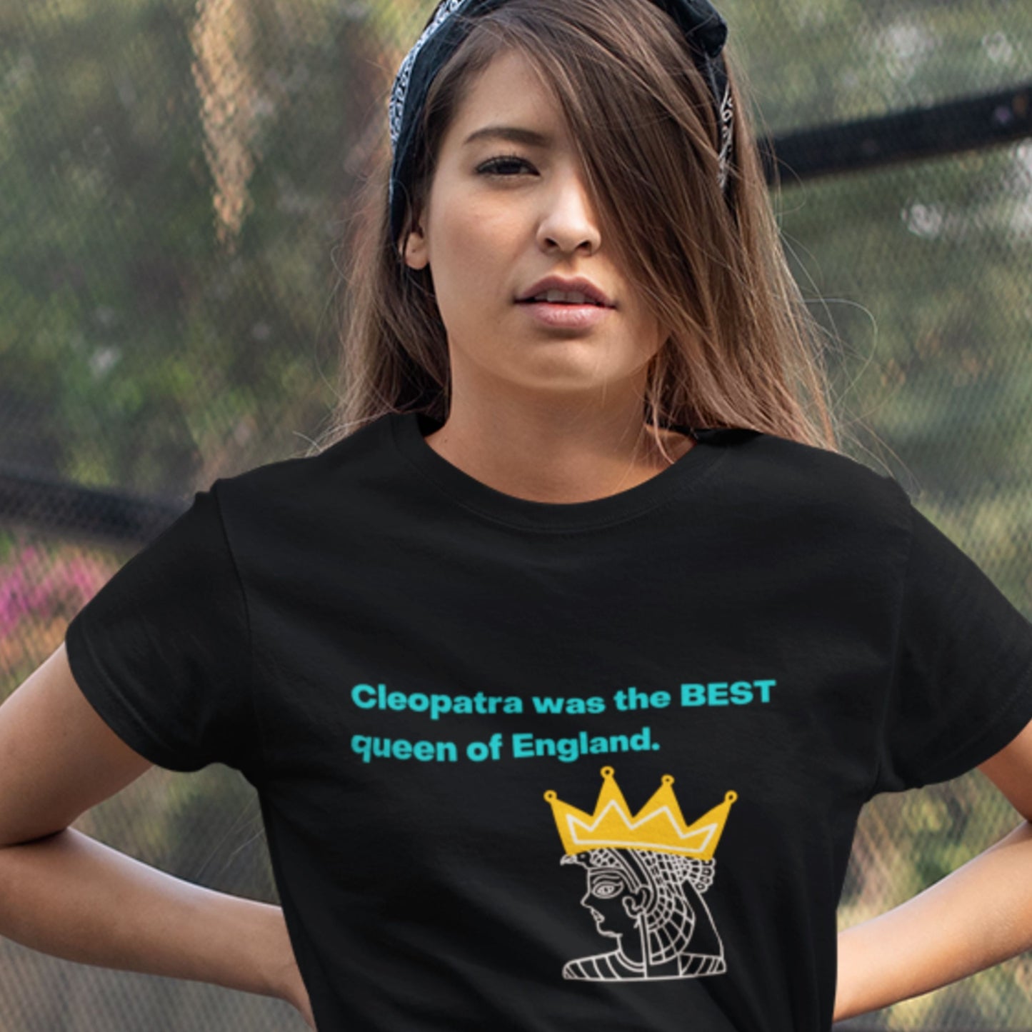 Person wearing a black t-shirt with a graphic and text about Cleopatra.