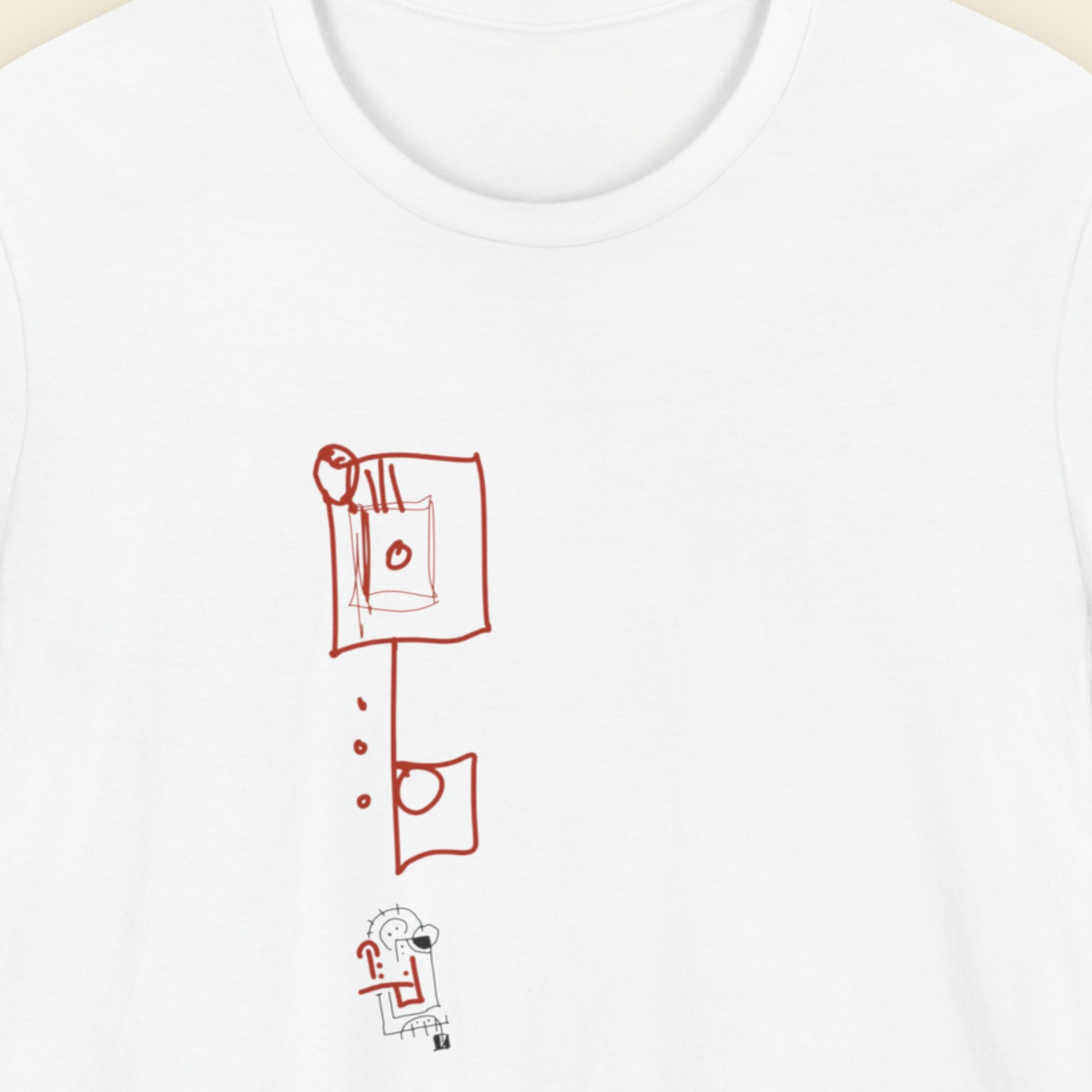 White t-shirt with a colorful abstract drawing on a beige background.