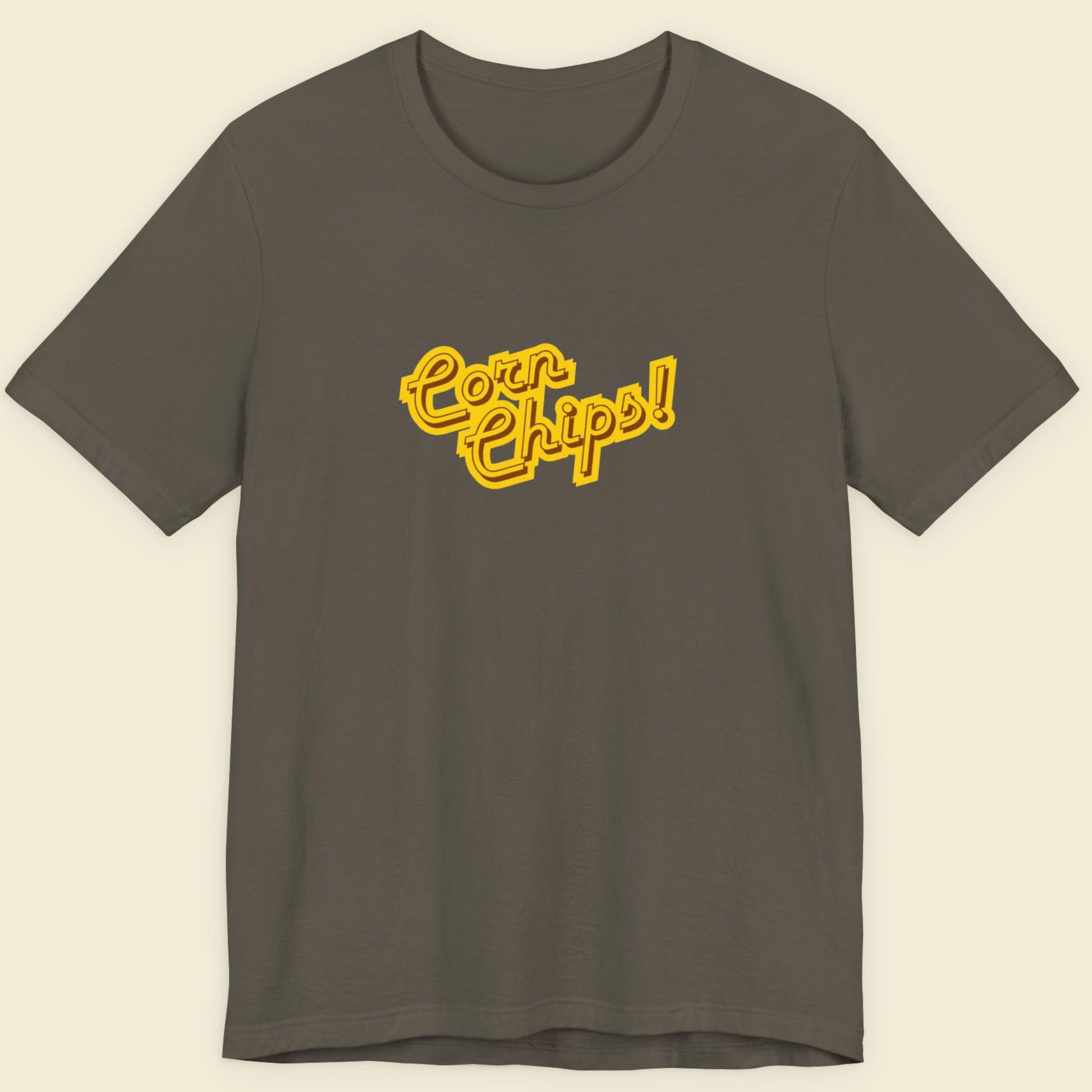 Army green t-shirt with multicolored 'Corn Chips!' text on a beige background.