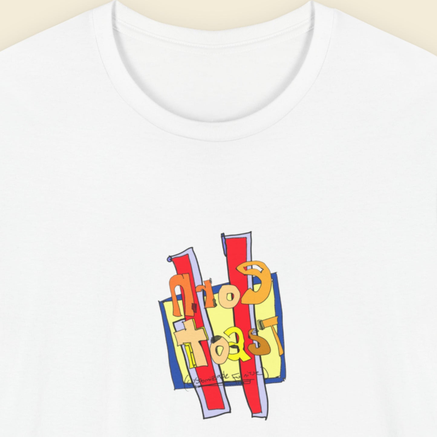 White t-shirt with colorful graphic design on a beige background
