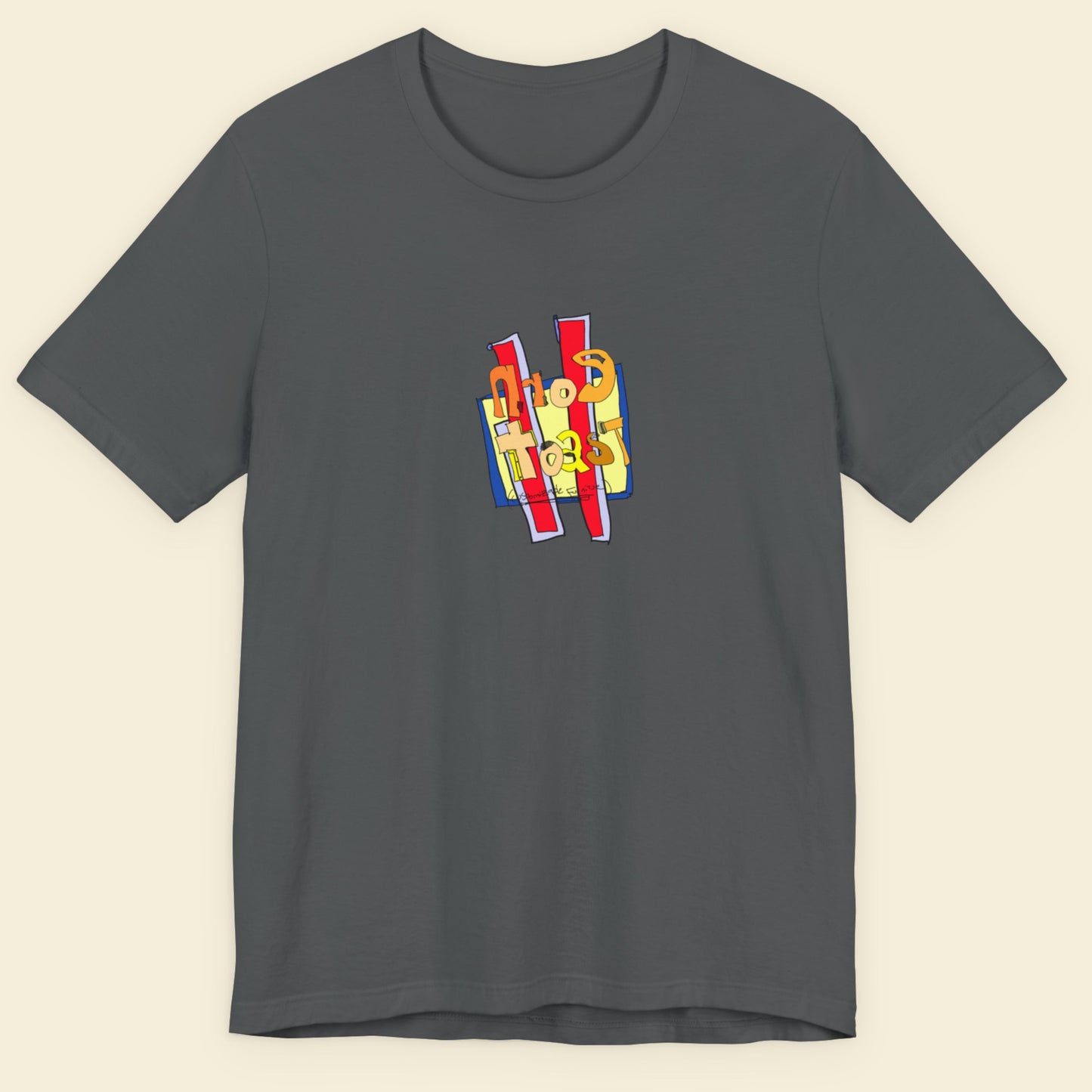 Grey t-shirt with a colorful abstract drawing on a beige background.