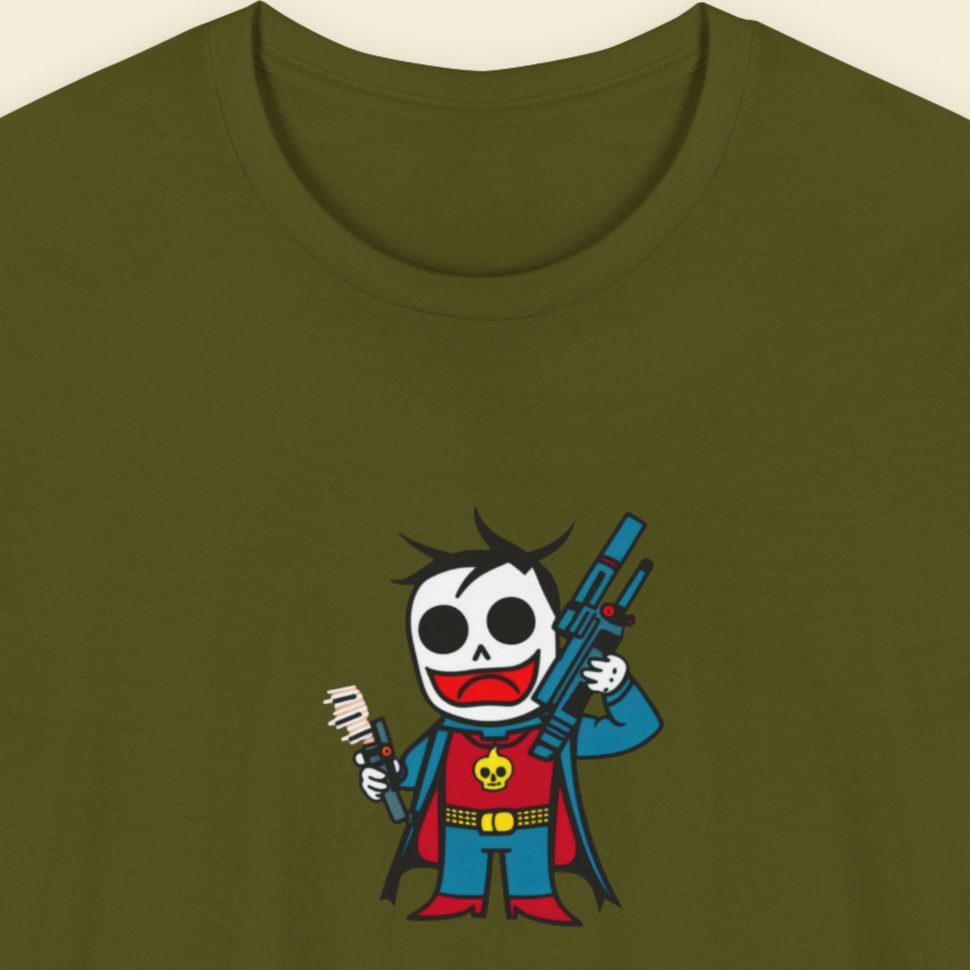 Green tee with a fun, colorful cartoon illustration on a beige background.