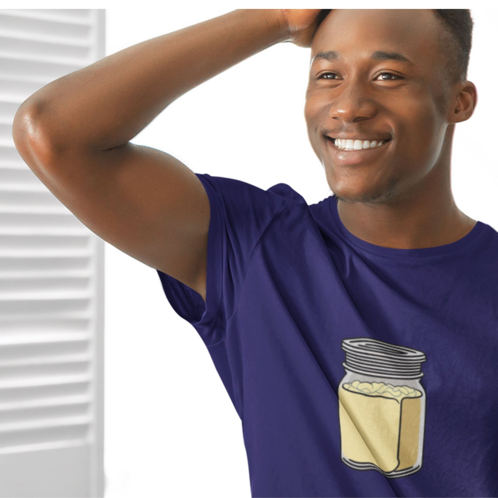 Man wearing a purple t-shirt with a jar graphic design on a white background