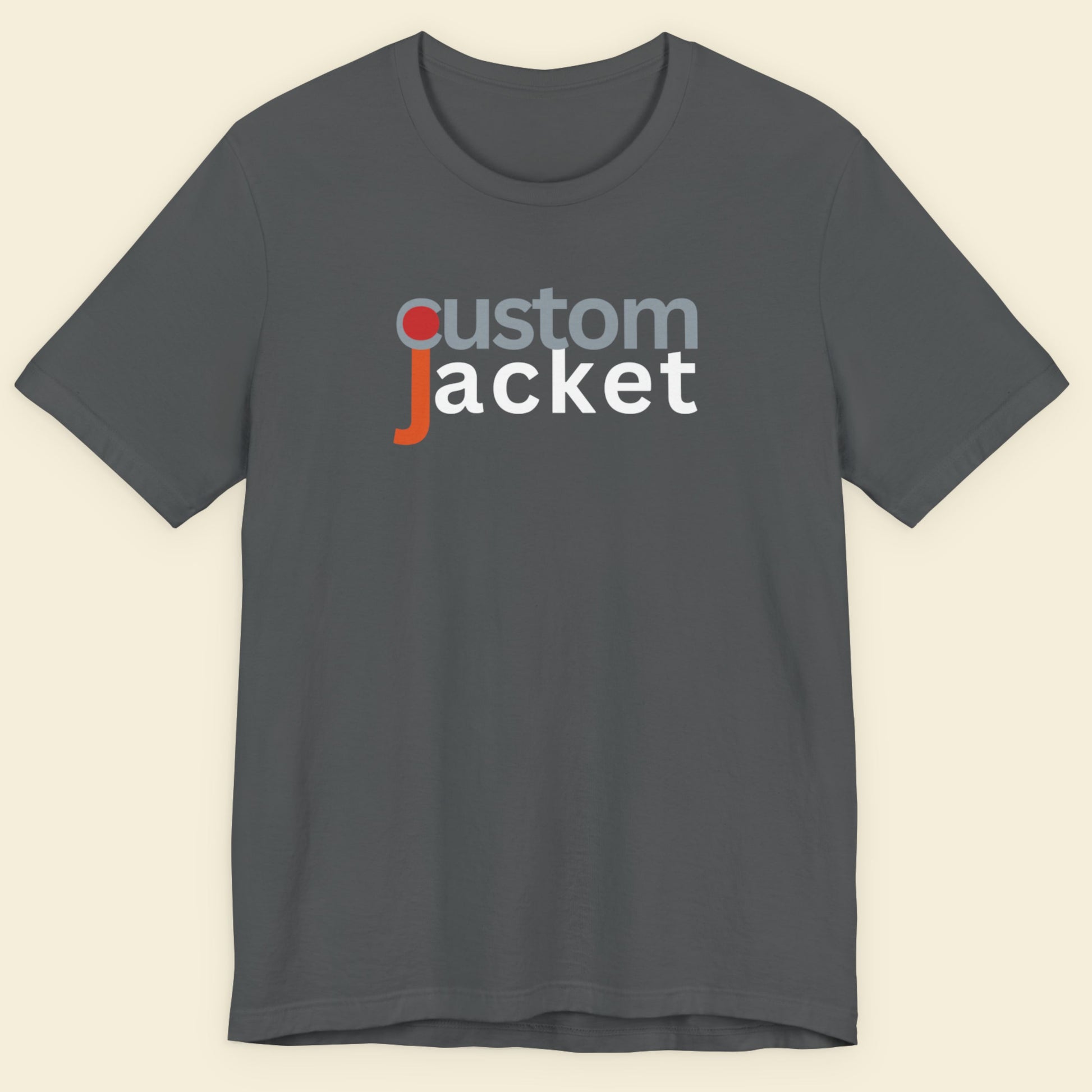 Gray t-shirt with 'custom jacket' text on a beige background.