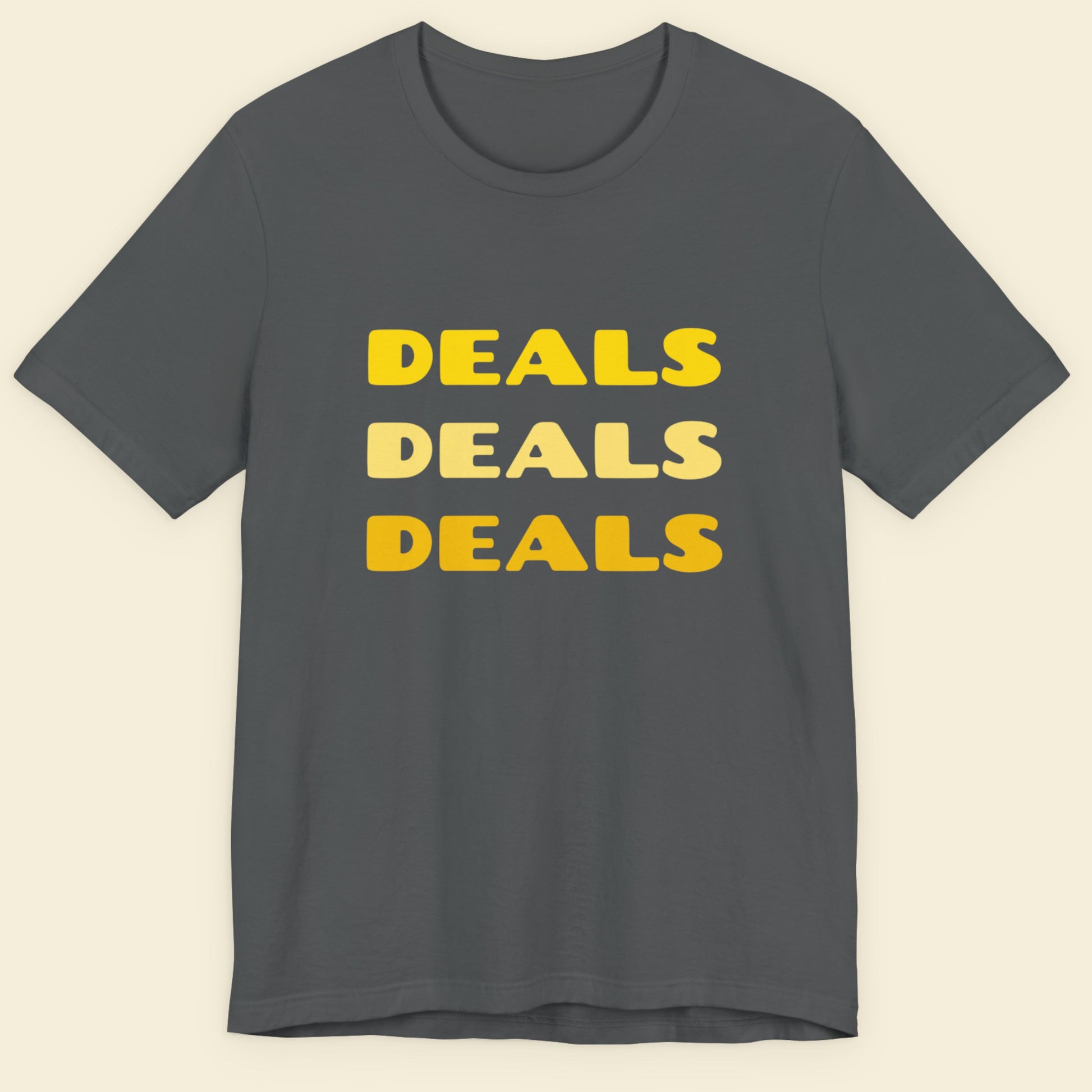 Gray t-shirt with 'DEALS DEALS DEALS' text in yellow on a beige background.