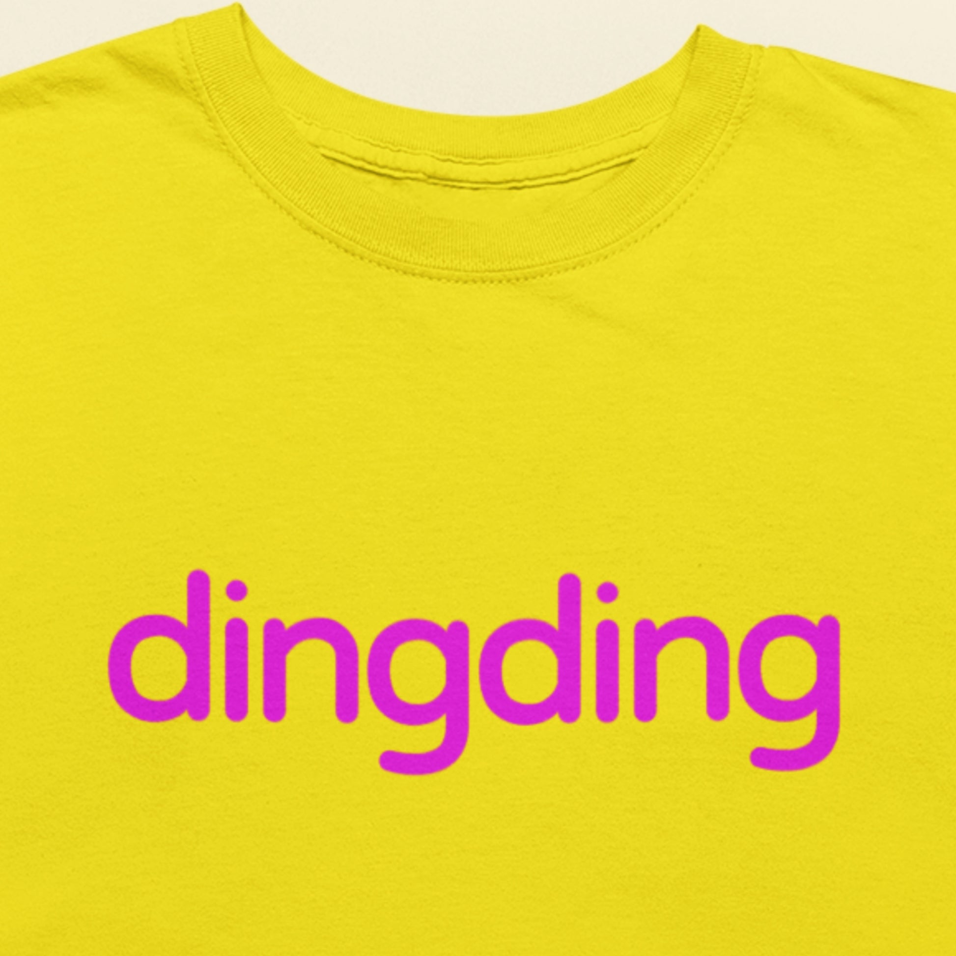 yellow shirt with purple text reading 'dingding'