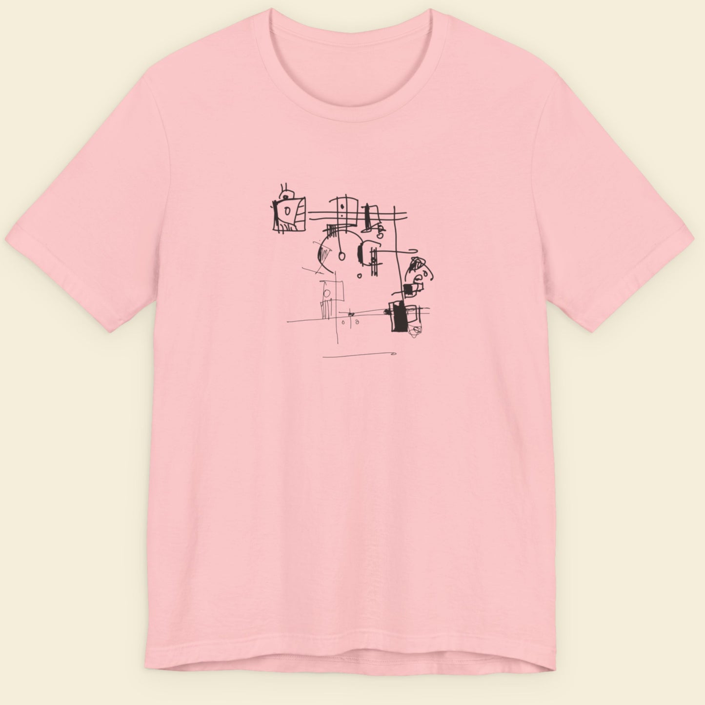Pink t-shirt with an abstract line drawing on a beige background.