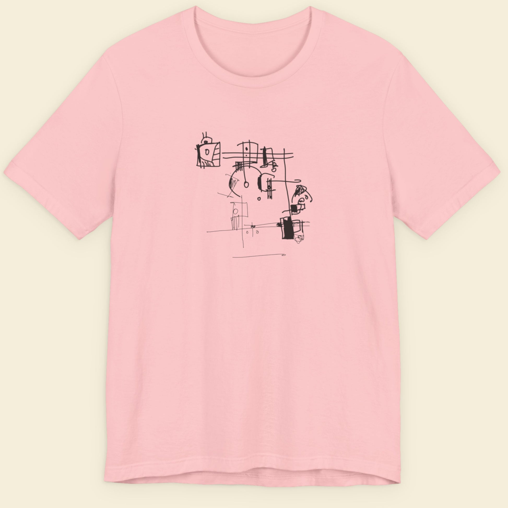 Pink t-shirt with an abstract line drawing on a beige background.