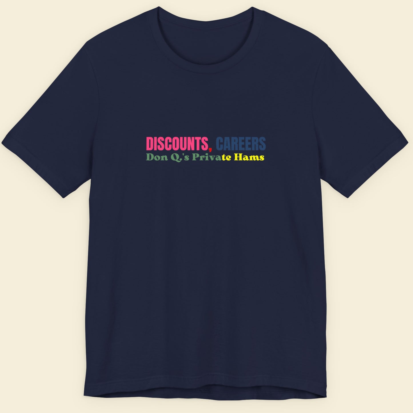 Navy blue t-shirt with colorful text on a beige background