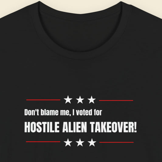 Black t-shirt with humorous colorful text on a beige background.