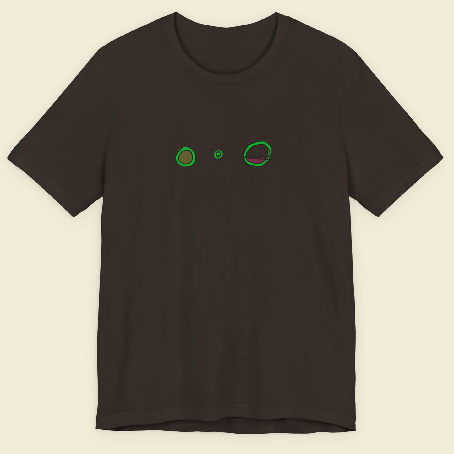Brown t-shirt with a colorful abstract drawing on a beige background.