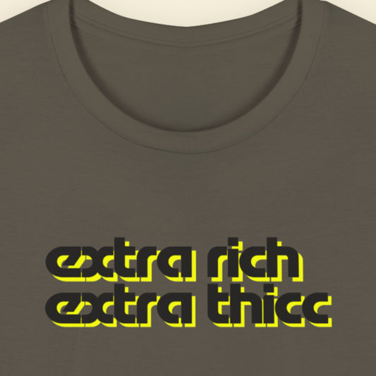 Army green t-shirt with 'extra rich extra thicc' text in black and yellow on a beige background.