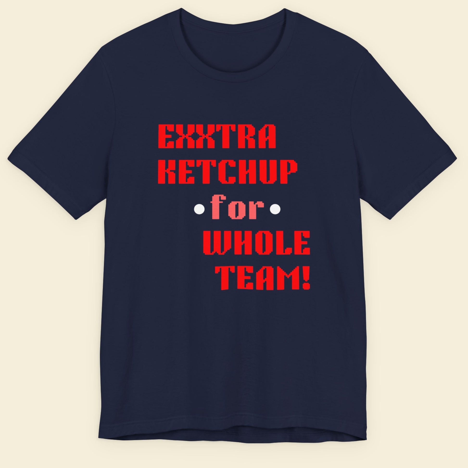 Navy blue t-shirt with red text on a beige background.