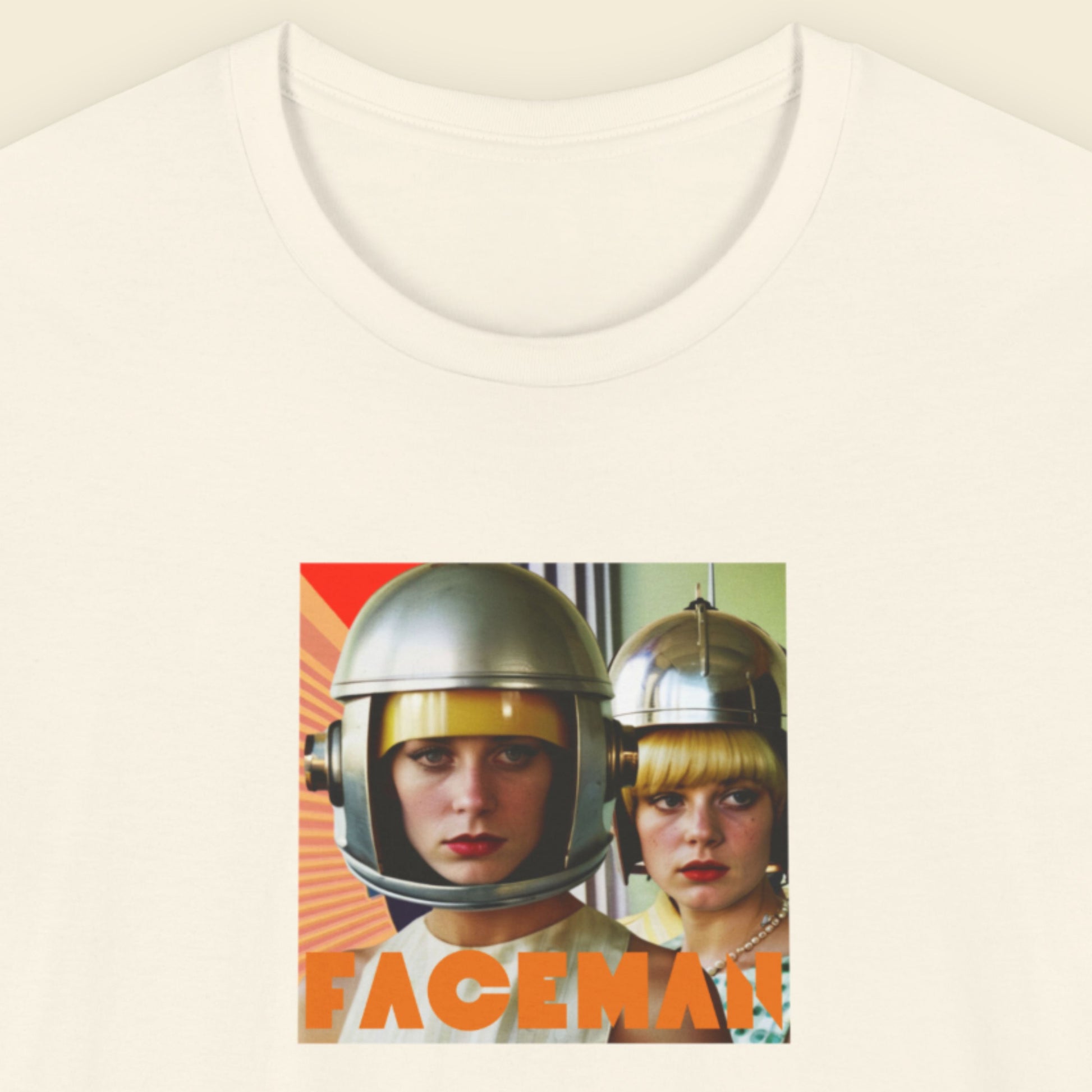 White t-shirt with a graphic of two people wearing helmets and the word 'FACEMAN' on a beige background.