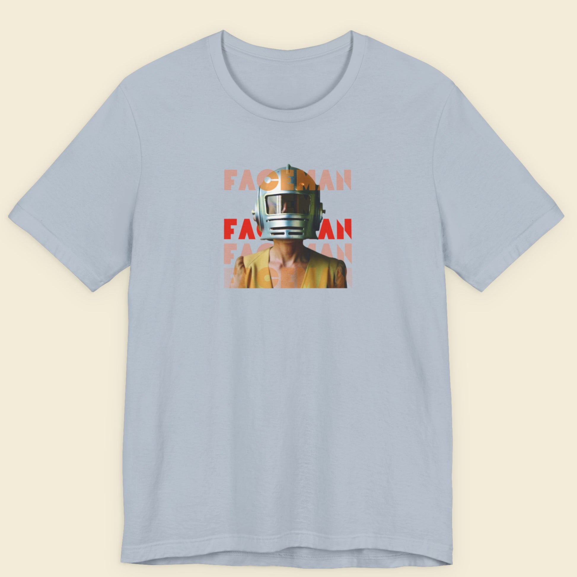 Light blue t-shirt with a graphic of a person wearing a helmet and 'FACEMAN' text on a beige background