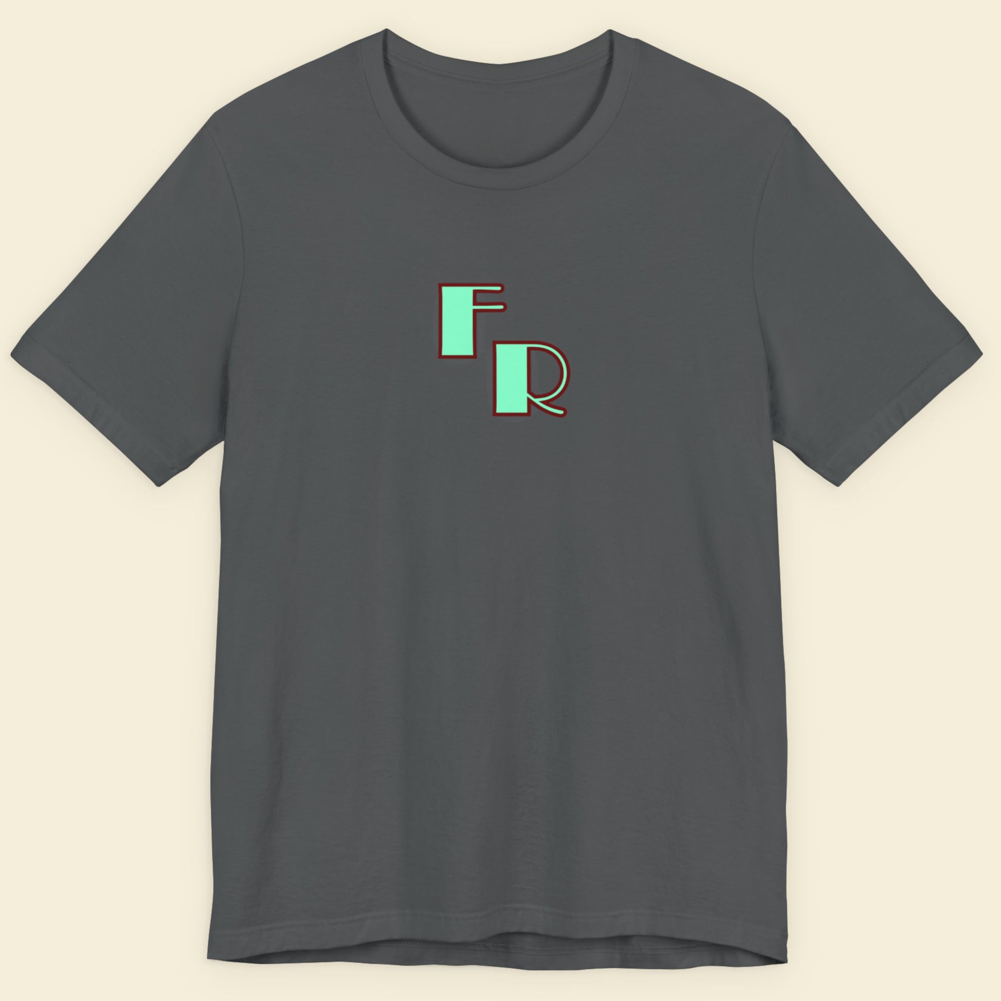 Gray t-shirt with 'FR' logo on a beige background