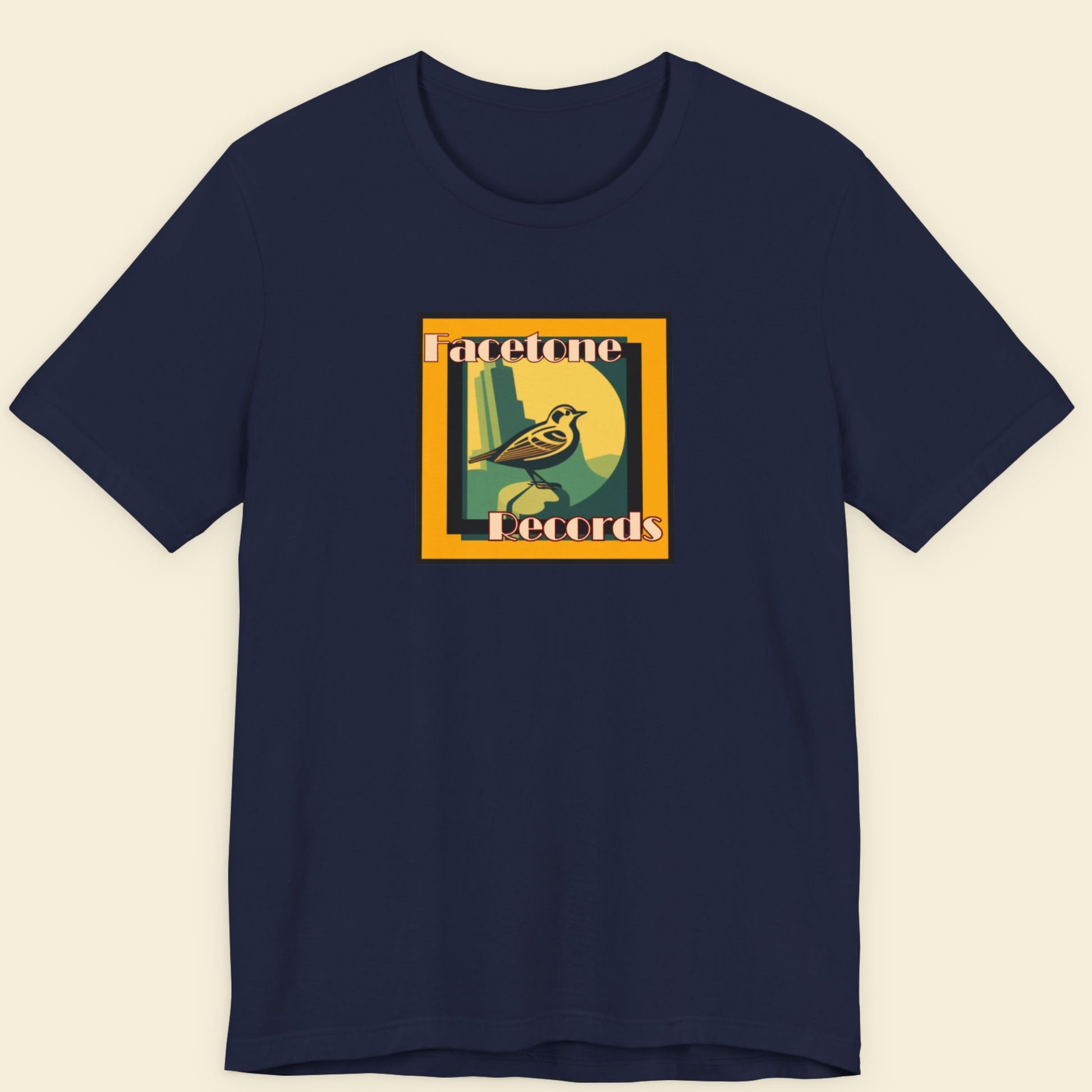Navy t-shirt with Facetone Records graphic featuring a bird design.