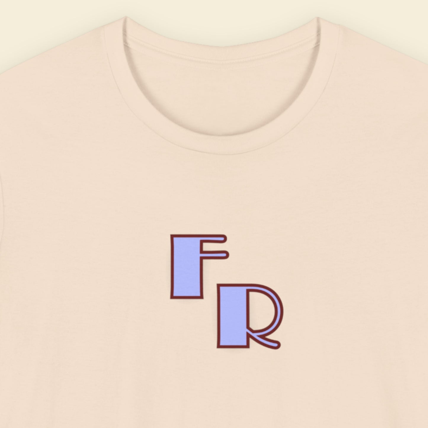 Beige t-shirt with 'FR' initials on a beige background