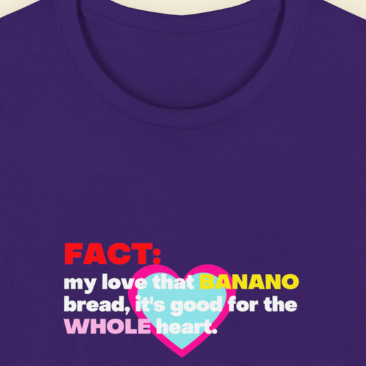 Purple t-shirt with colorful text and heart graphic on a plain background.