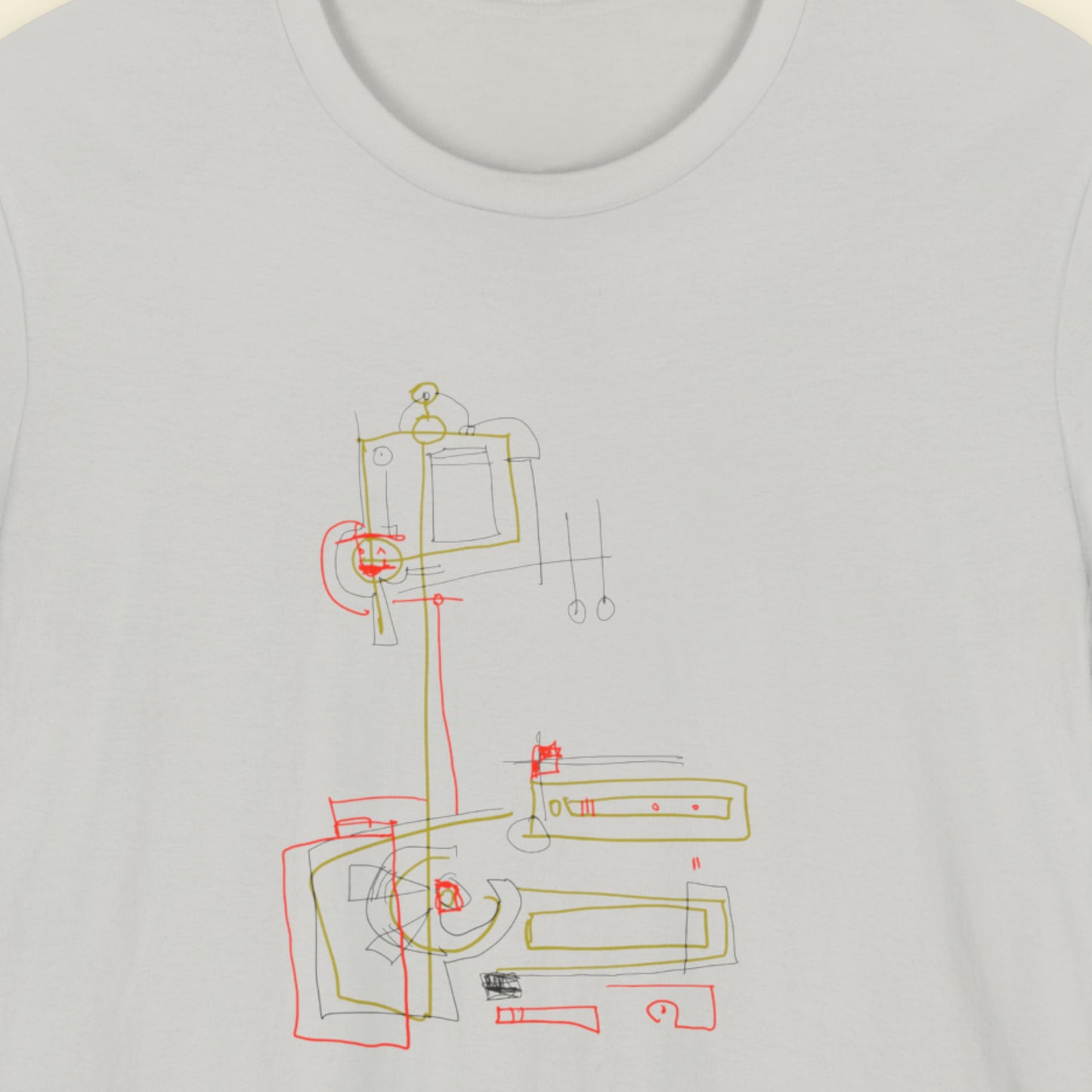 Light grey t-shirt with a colorful abstract drawing on a beige background.