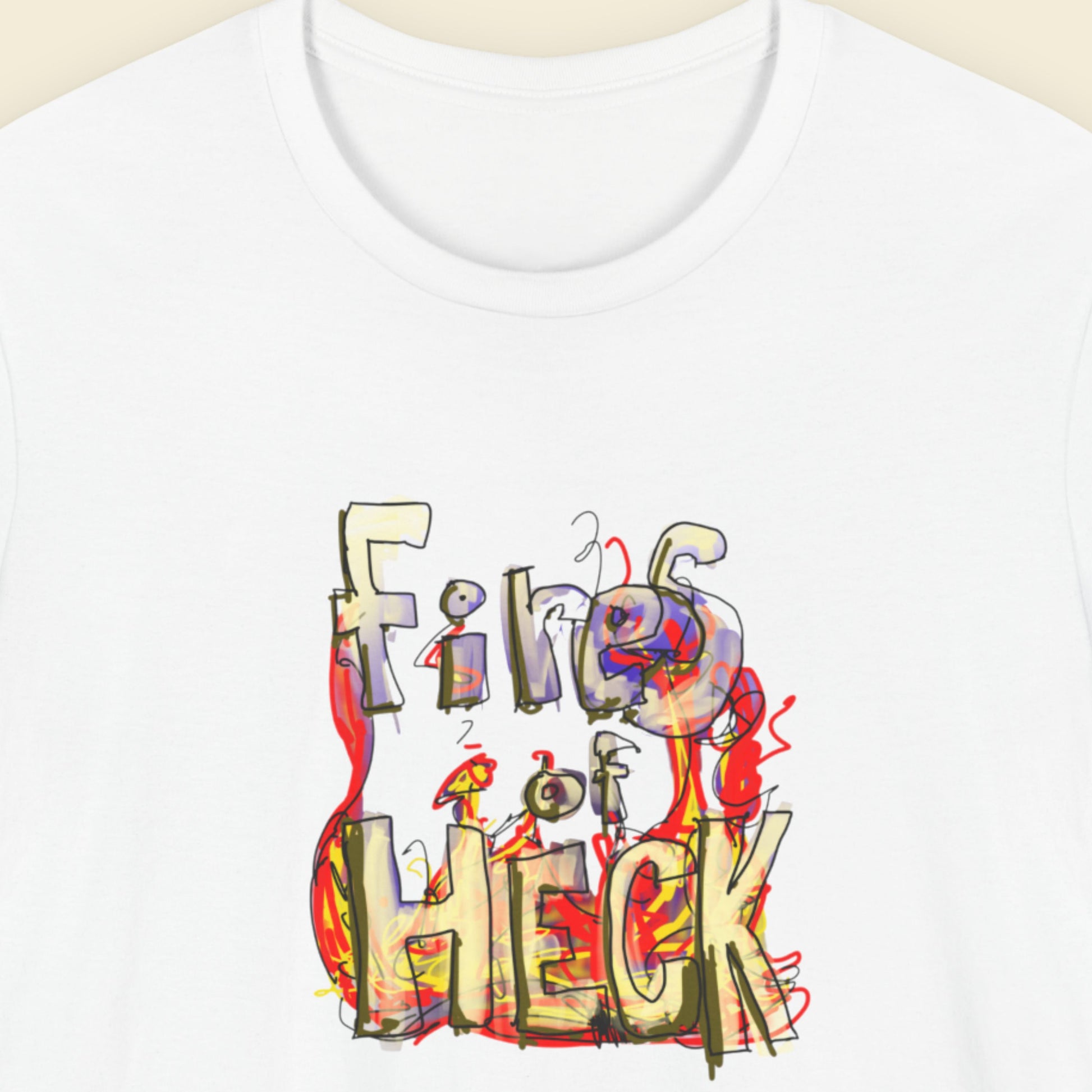 White t-shirt with a colorful drawing on a beige background.