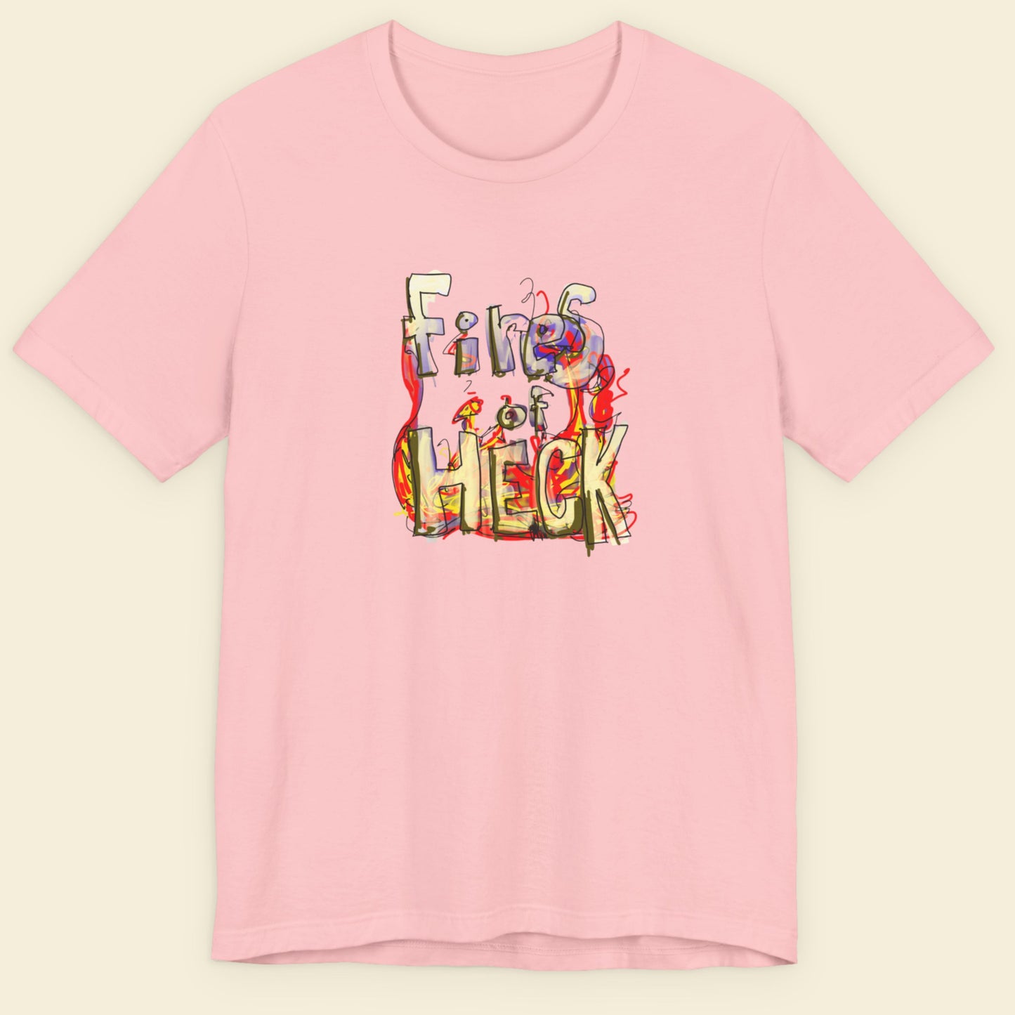 Pink t-shirt with a colorful drawing on a beige background.