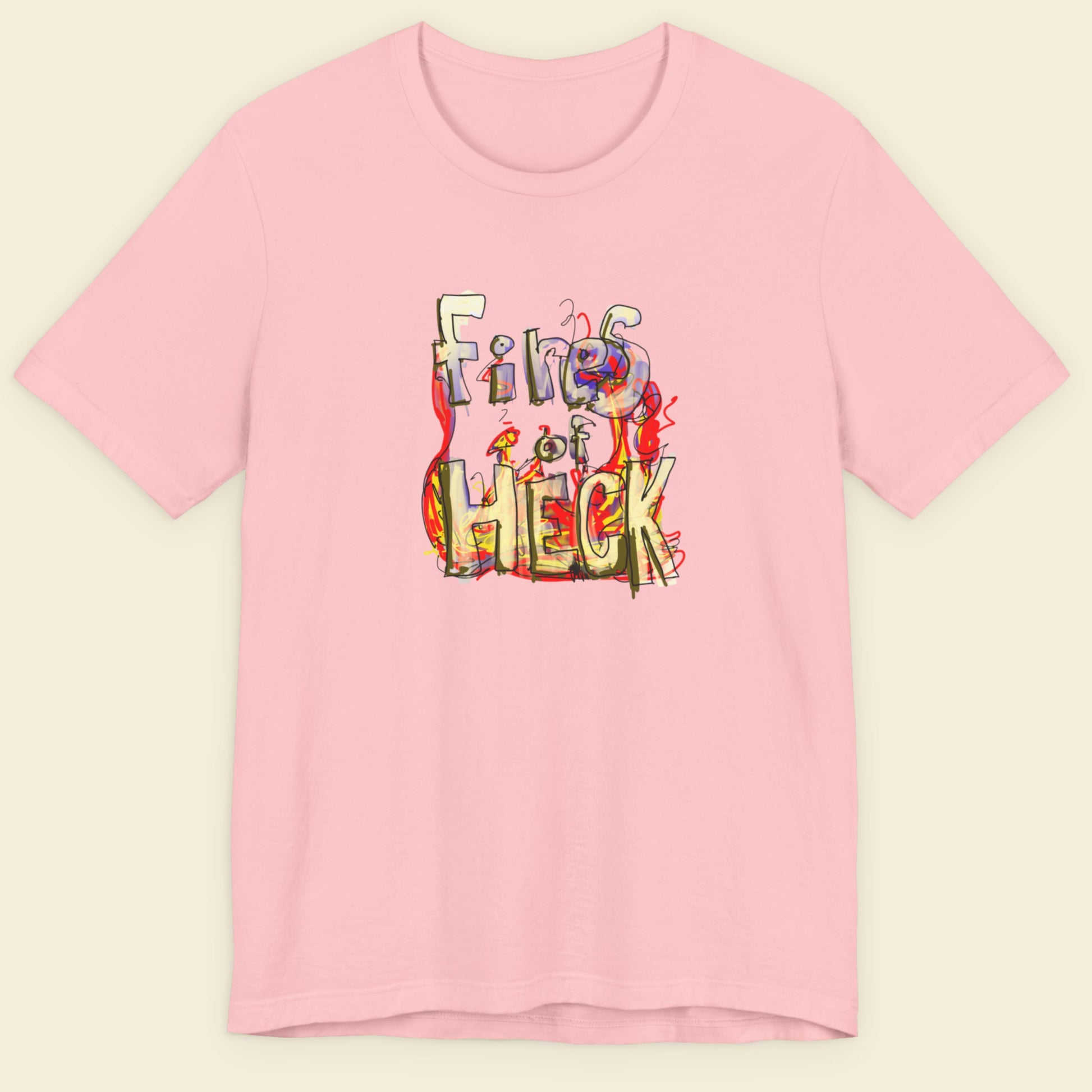 Pink t-shirt with a colorful drawing on a beige background.